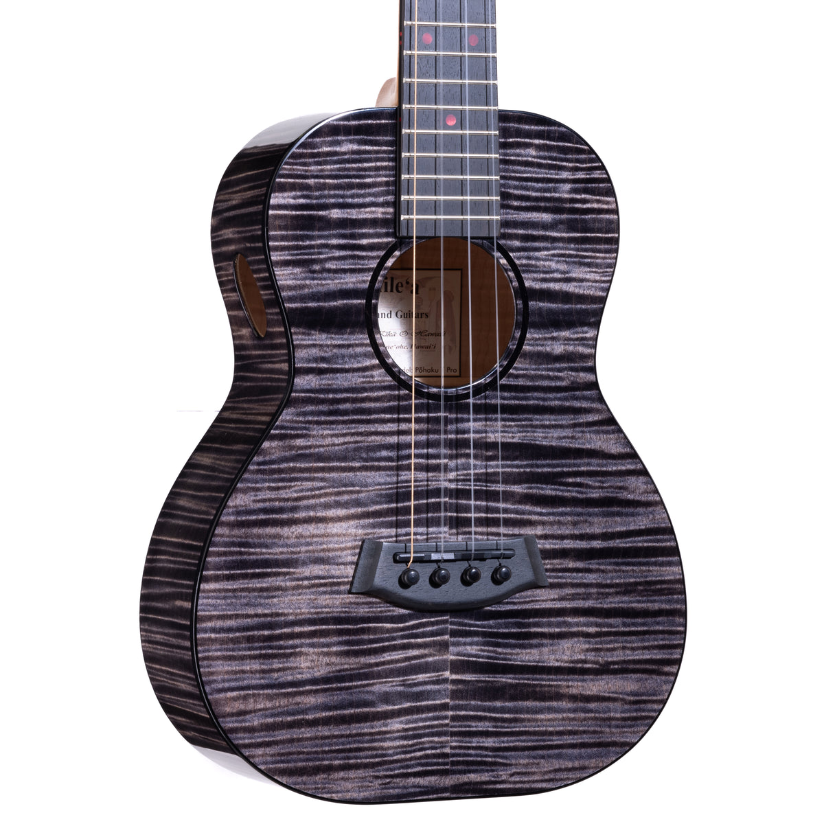 Angled close-up of the flamed maple top, bridge and soundhole on Kanile'a Pohaku Pro tenor ukulele, serial 30197