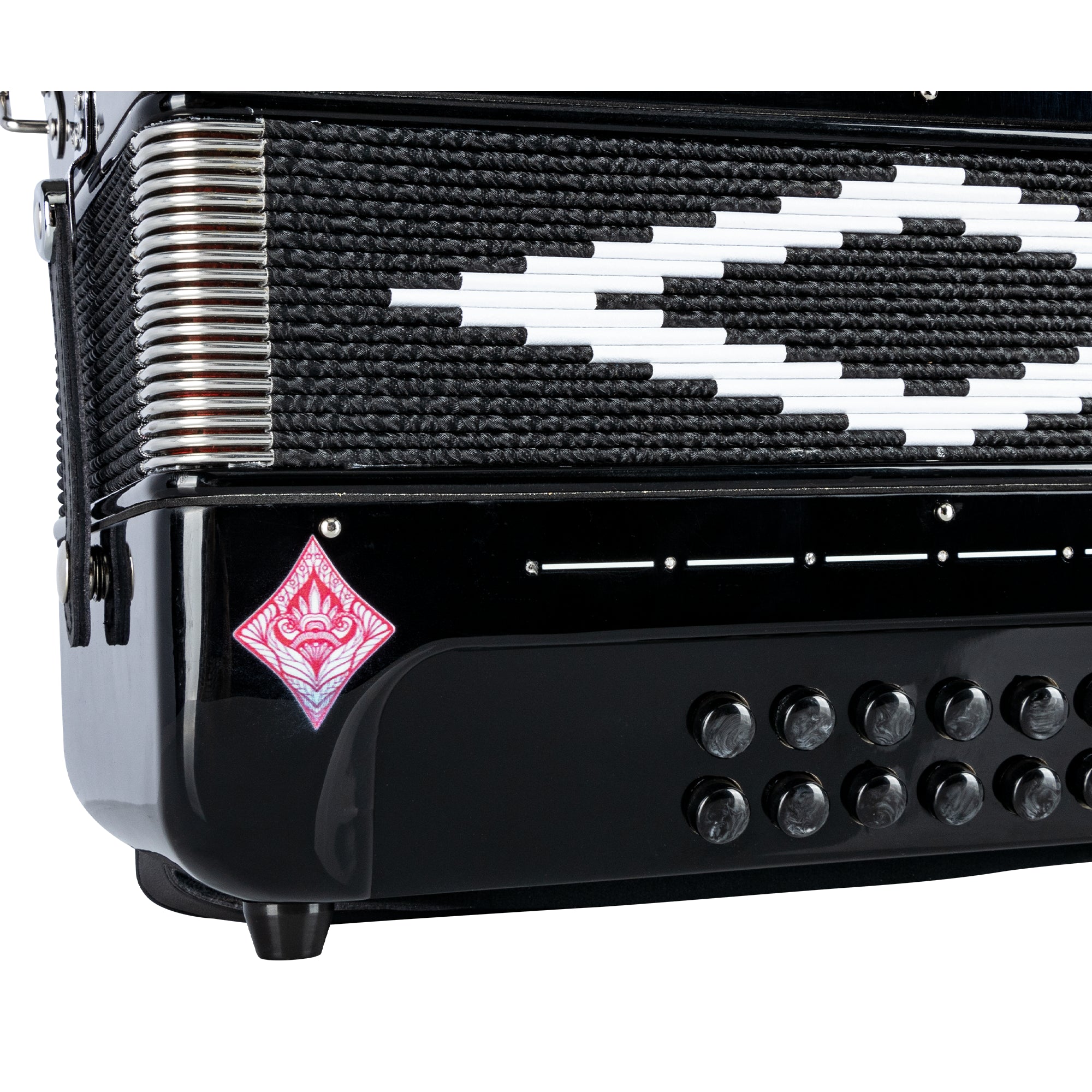 Close-up of a black accordion with a white geometric pattern on the bellows and a pink and white logo decal on the front.