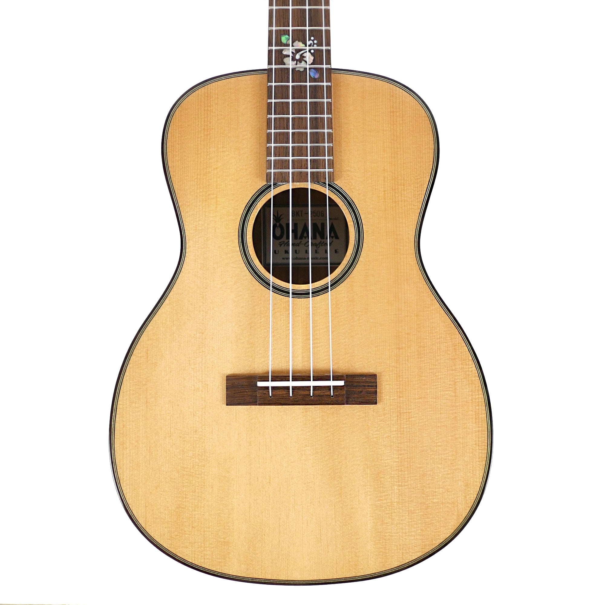 Close-up front view of the Ohana BKT-250G showing its solid spruce top, hardwood bridge, striped rosette, binding, and floral fretboard inlay.