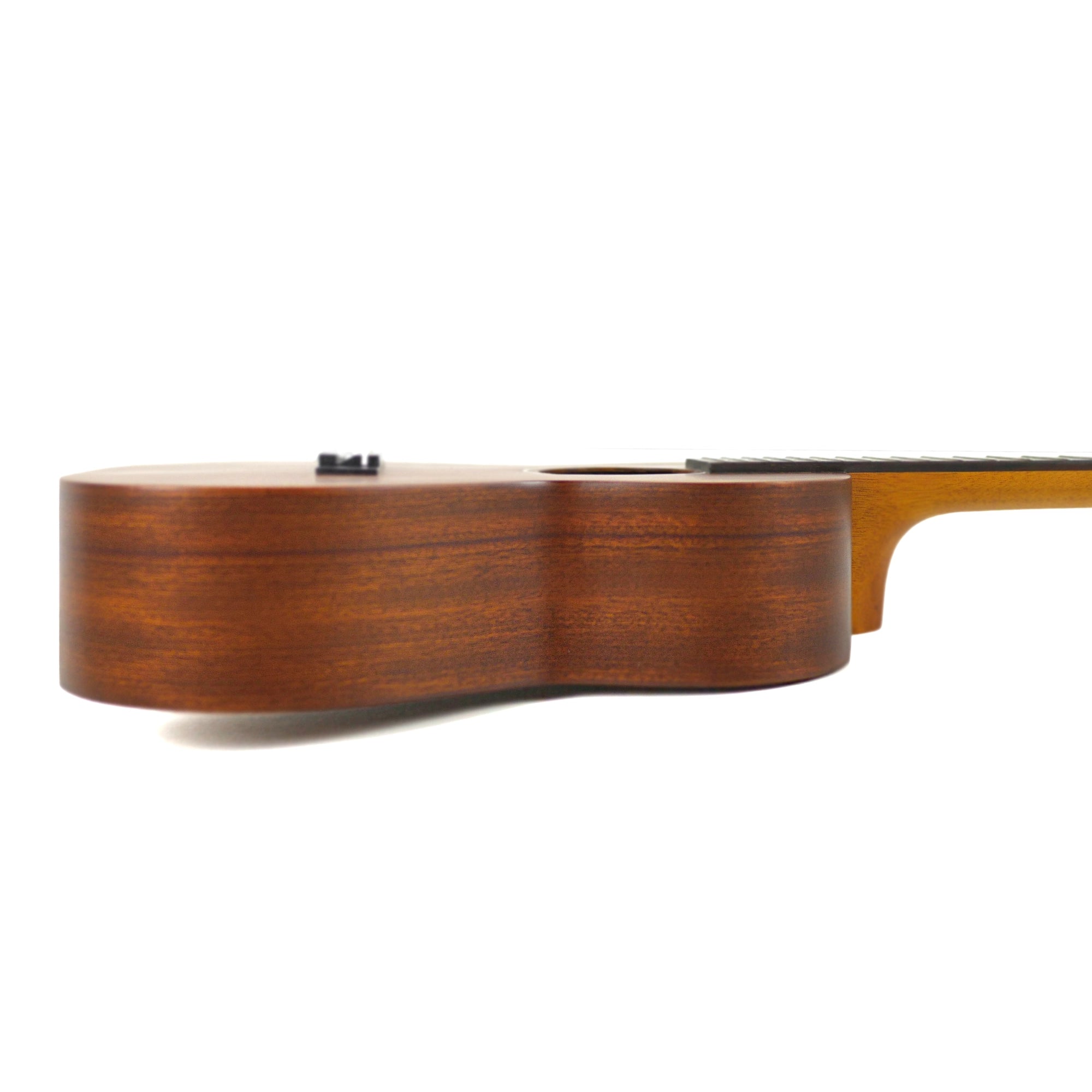 Side profile highlighting the solid mahogany sides and satin finish of the Ohana CK-25.