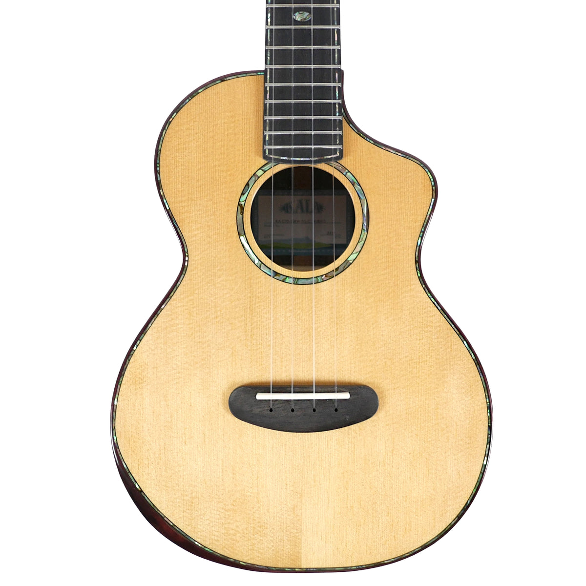 This close-up of the Kala CTD-SSRW-TG-C Tenor Ukulele highlights its deluxe solid spruce top, abalone rosette, and Venetian cutaway.