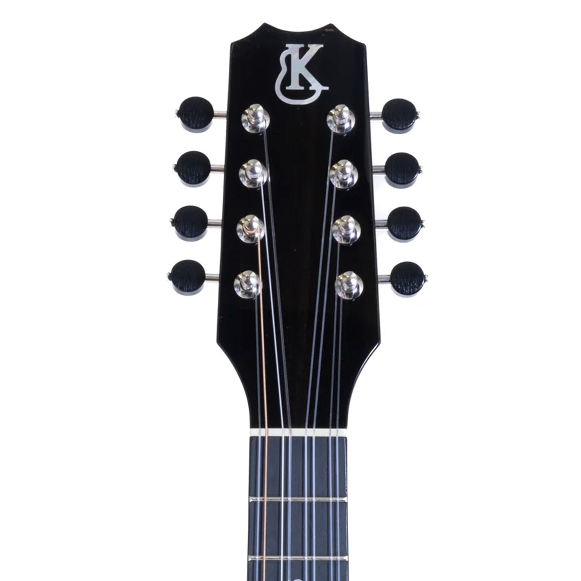 Close-up of a uke headstock with a brand logo on a white background