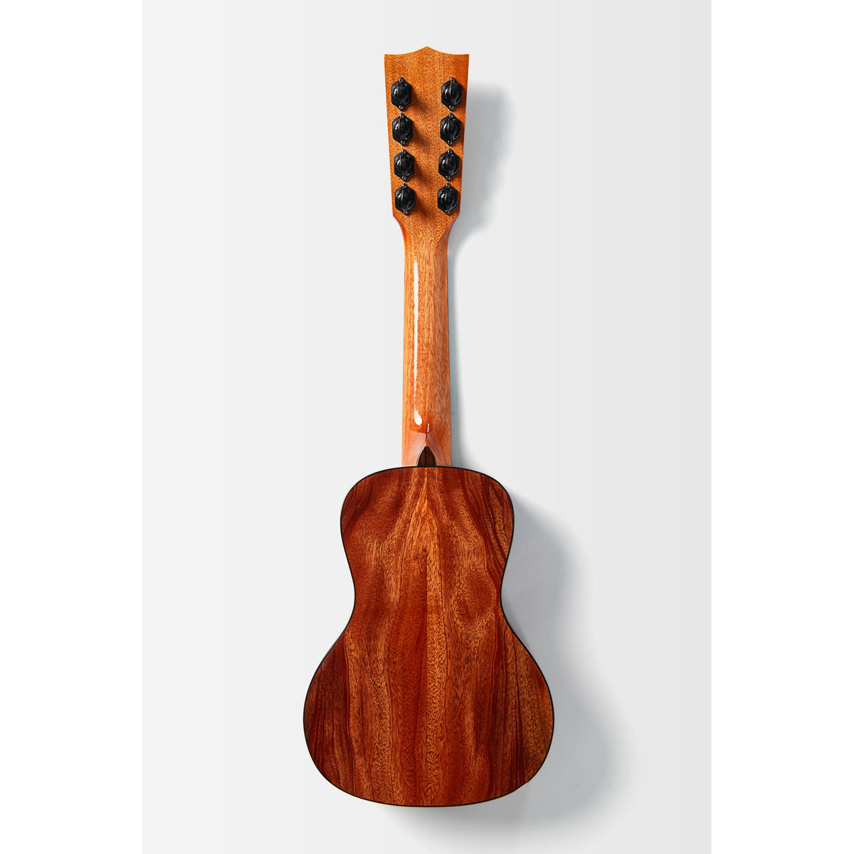 Back of the Kala KA-TARO-ASMH-C showing the solid mahogany back and mahogany neck