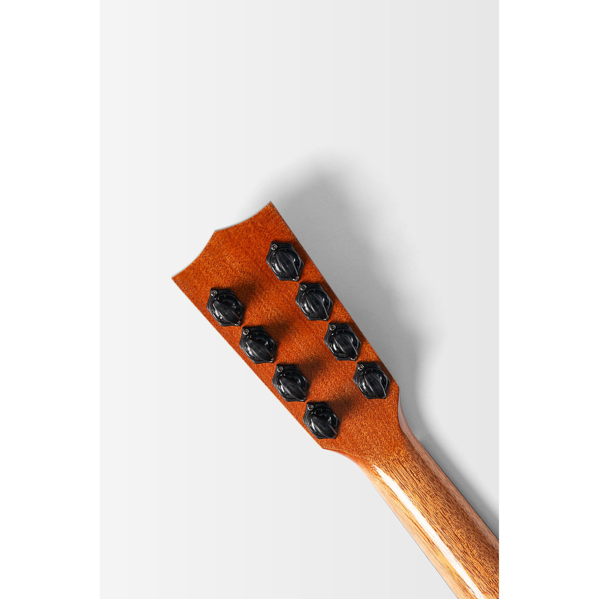 Back of the Kala KA-TARO-ASMH-T headstock showing the eight tuners