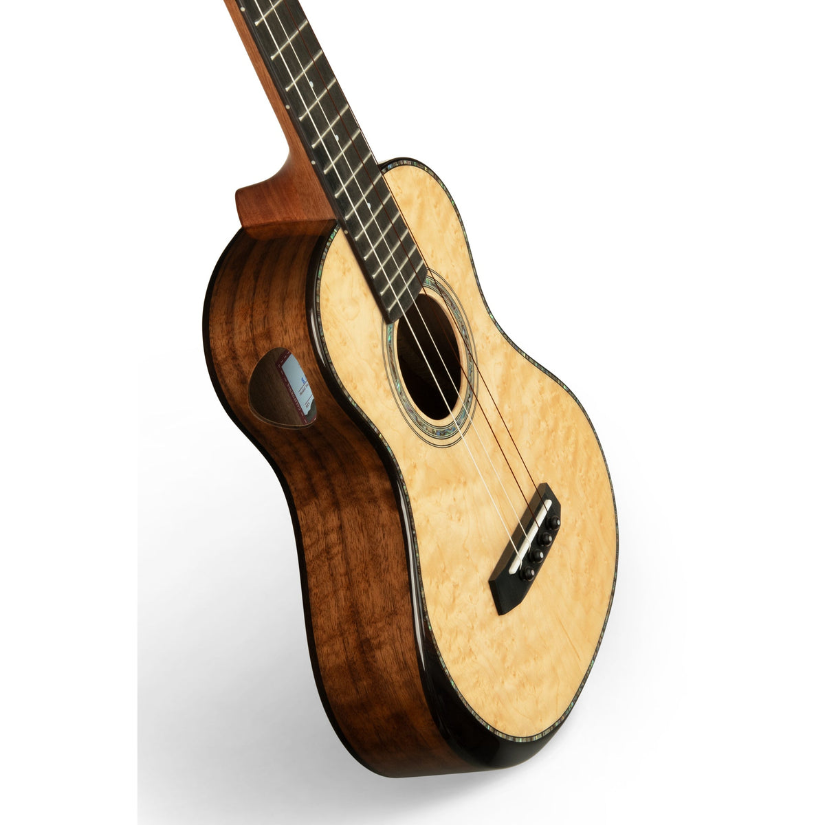Angled view of the Kala KA-WCW-BMP-TXL showing the gloss walnut sides and mahogany comfort edge