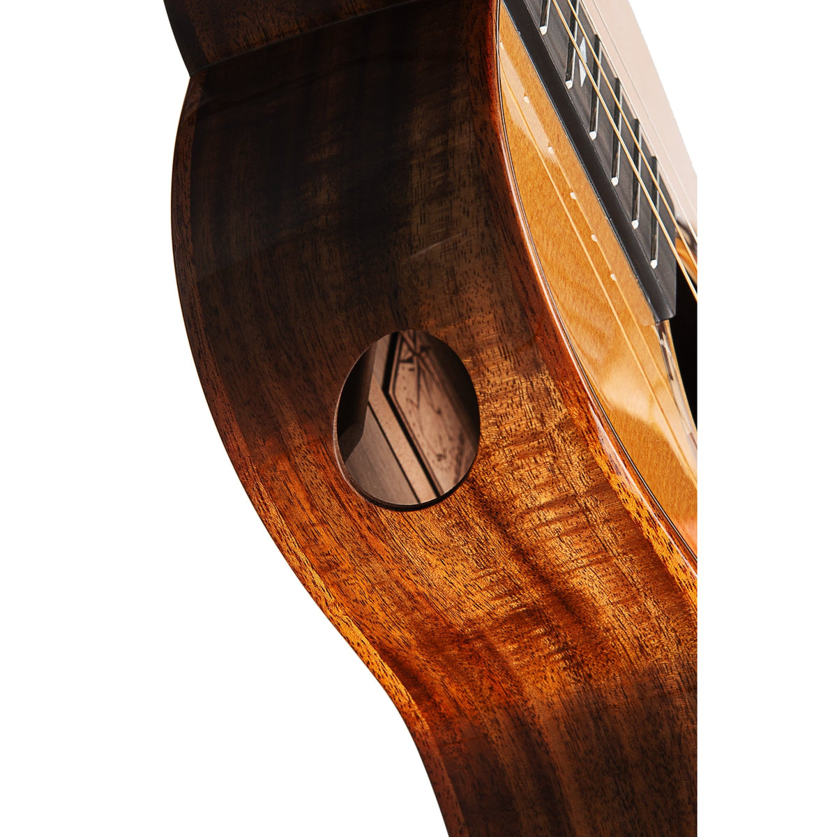 Close-up of the offset side sound port in the acacia side of the Kala KA-WP-CA-GB-E