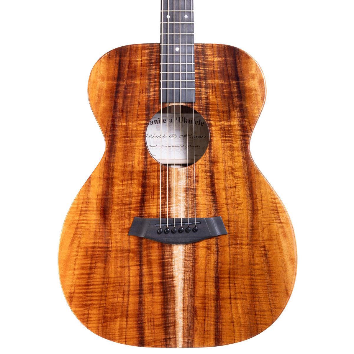 Example photo: an earlier Kanile'a KG-1 Pro, serial G0009, body front with Premium Grade koa