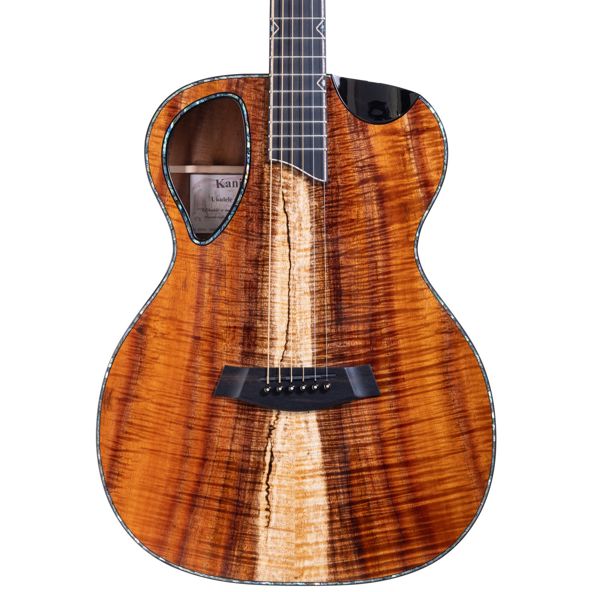 Example photo: an earlier Kanile'a KG-5, serial G0069, body front with Master Grade curly koa and ebony bevel cutaway