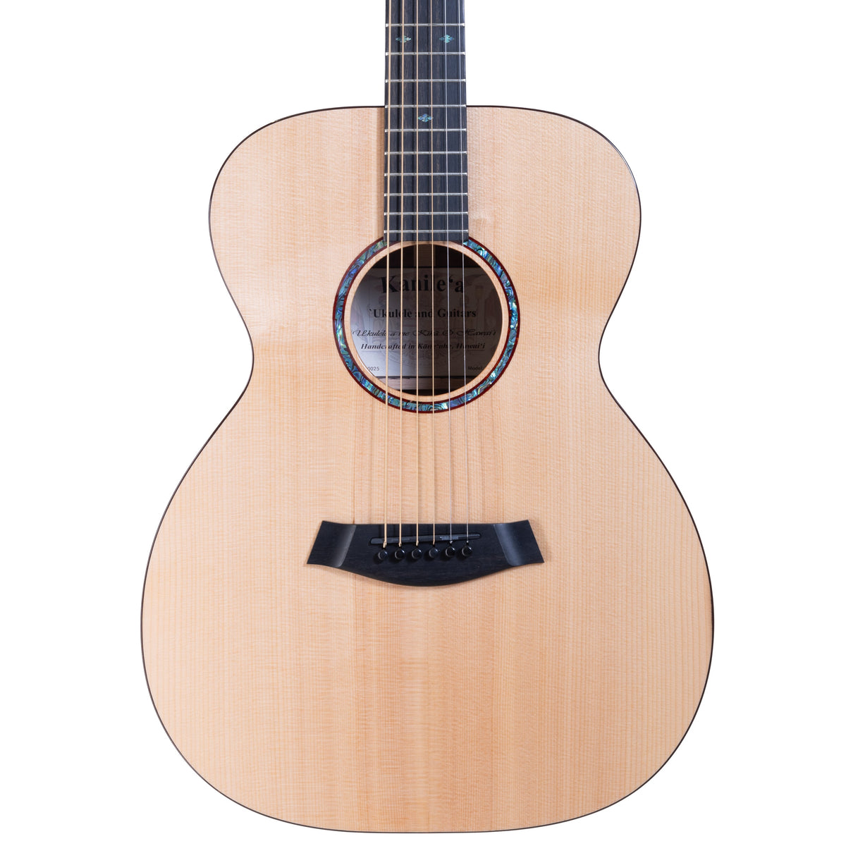 Example photo: an earlier Kanile'a KSG-2 Pro, serial G0025, body front with Sitka spruce top and abalone rosette