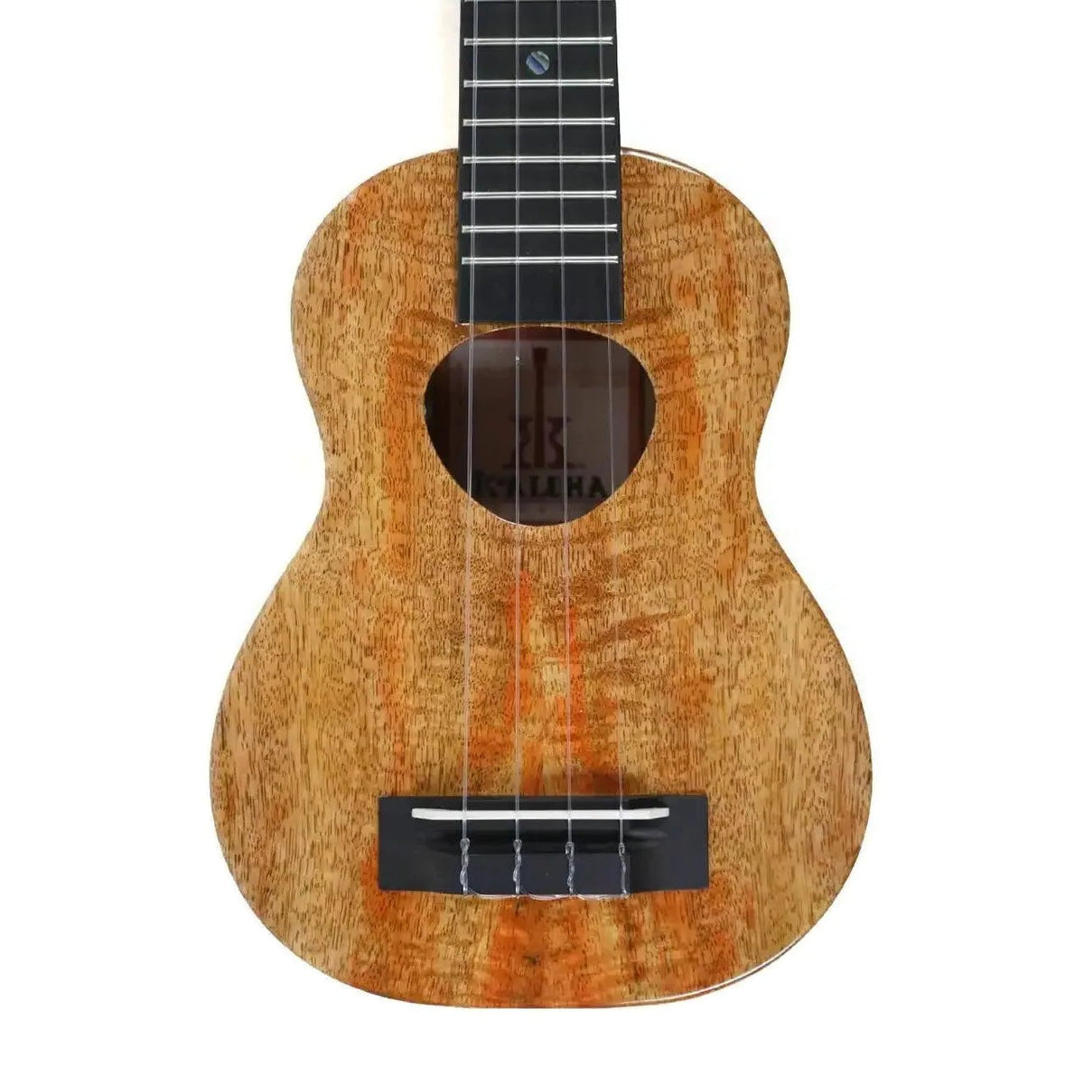 Example photo: front of the body of an earlier KoAloha KSM-02MG gloss solid mango long neck soprano ukulele, with the Musubi soundhole, ebony bridge and part of the fretboard