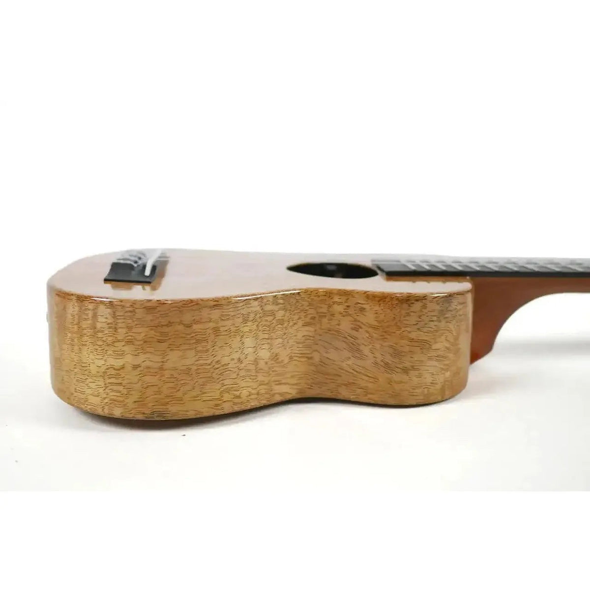 Example photo: side view of an earlier KoAloha KSM-02MG gloss solid mango long neck soprano ukulele