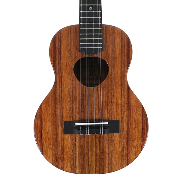 KoAloha KTM-16 Imaikalani 6-string tenor ukulele #1, close-up of the solid koa top, soundhole and ebony bridge