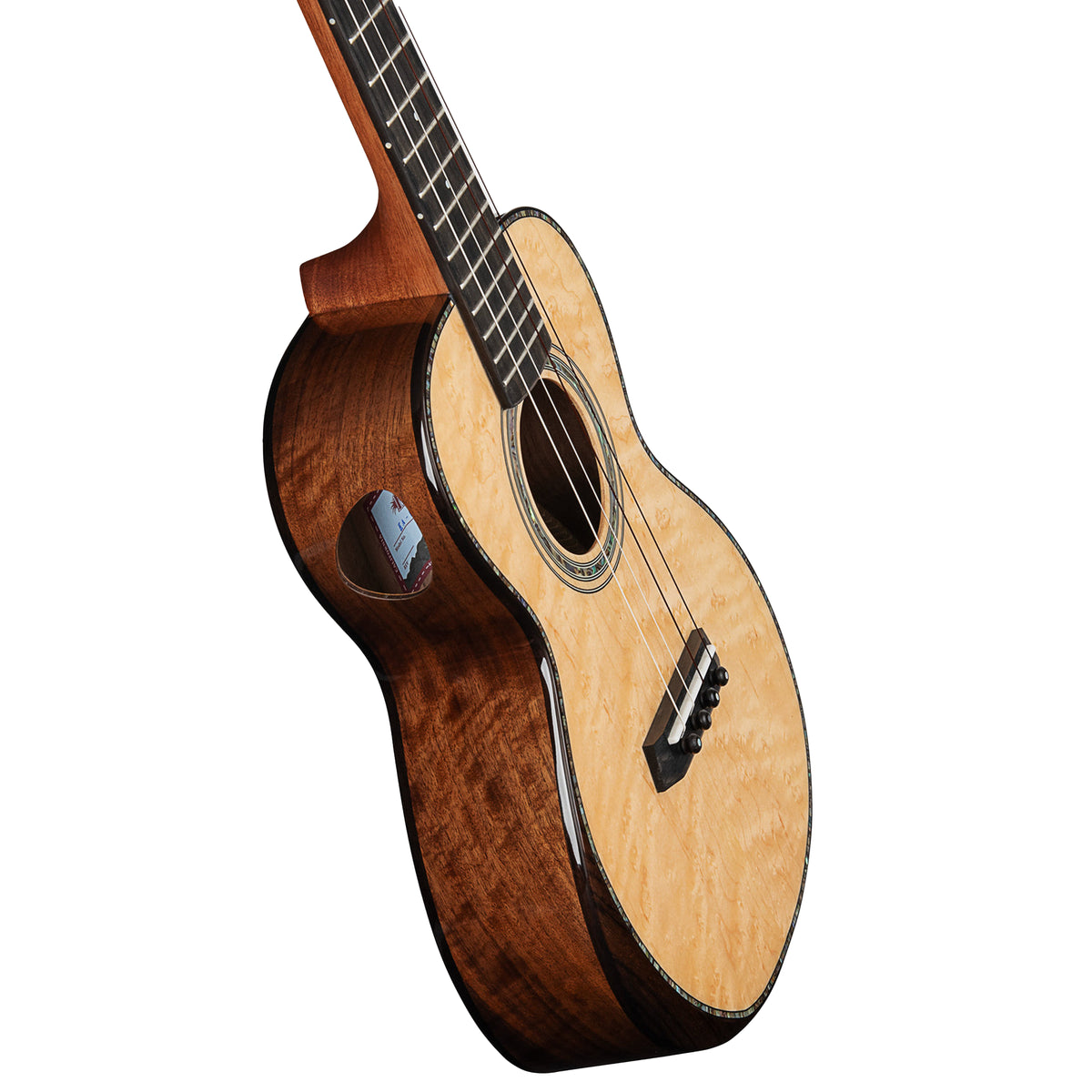 A close-up of a wooden ukulele showing its natural top, rich dark brown body, and black neck against a solid white background.