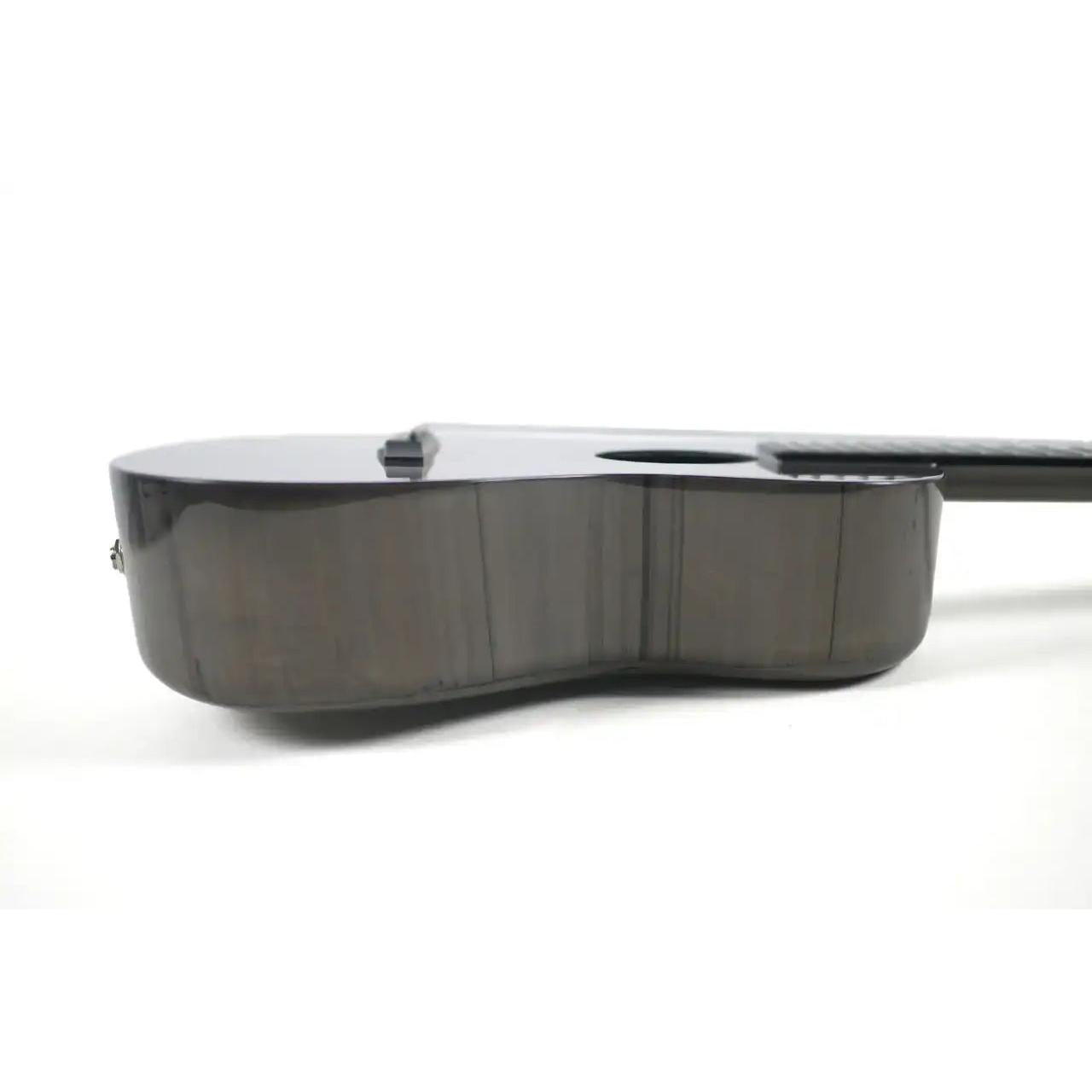 Klōs Carbon Timber tenor ukulele with a glossy dark finish and durable composite body on a white background.