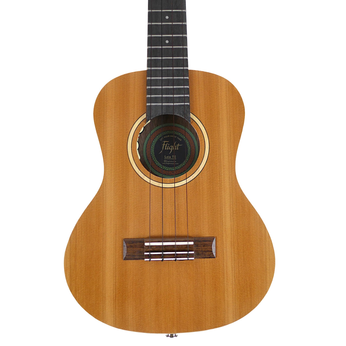 The close-up highlights the solid cedar top, maple rosette, and Purpleheart bridge of the Flight Leia TE Tenor Ukulele.