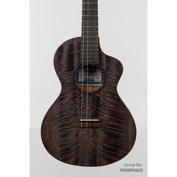 Kala METD-BMR-B Metropolitan Deluxe baritone ukulele, serial 925090623, front view showing the solid mango top's dark figured grain and ebony rosette with red purfling