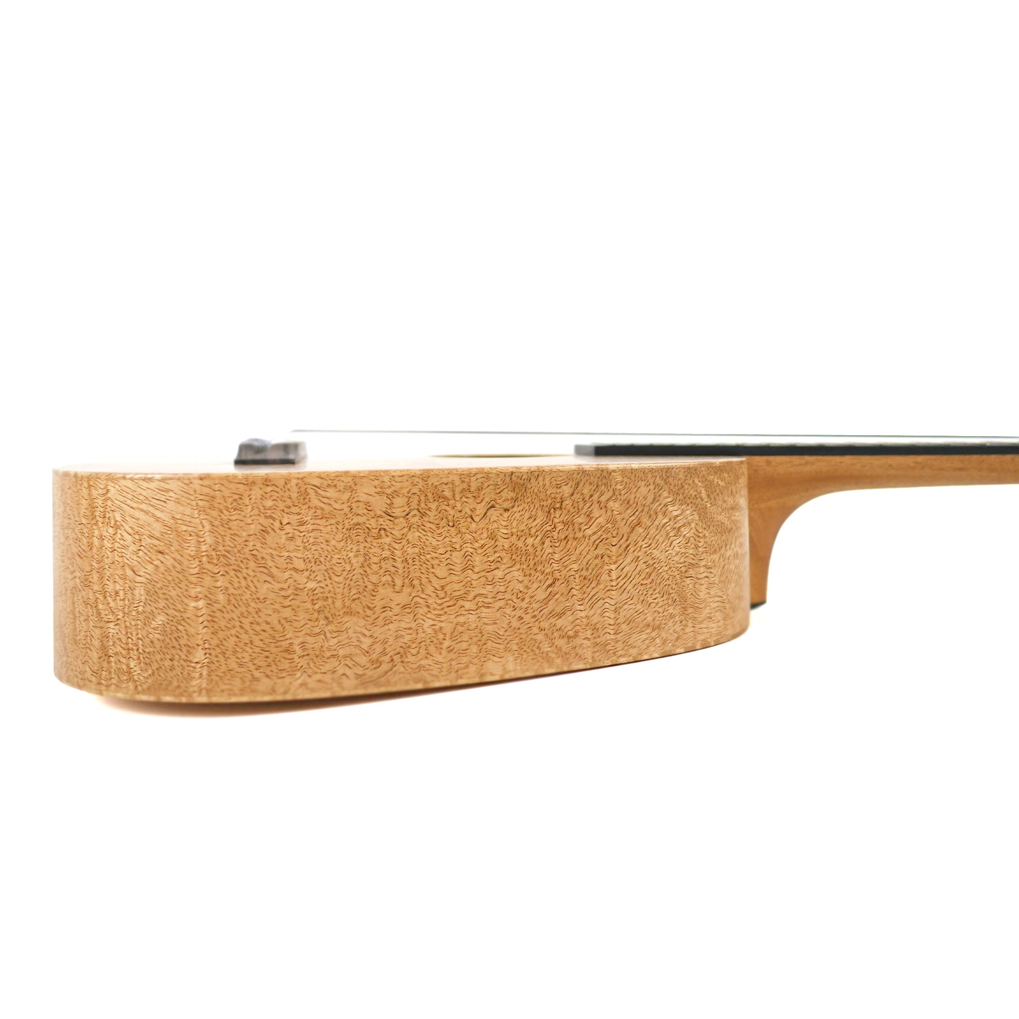 Side profile highlights the solid mango sides and glossy finish of the Pono MGTD.