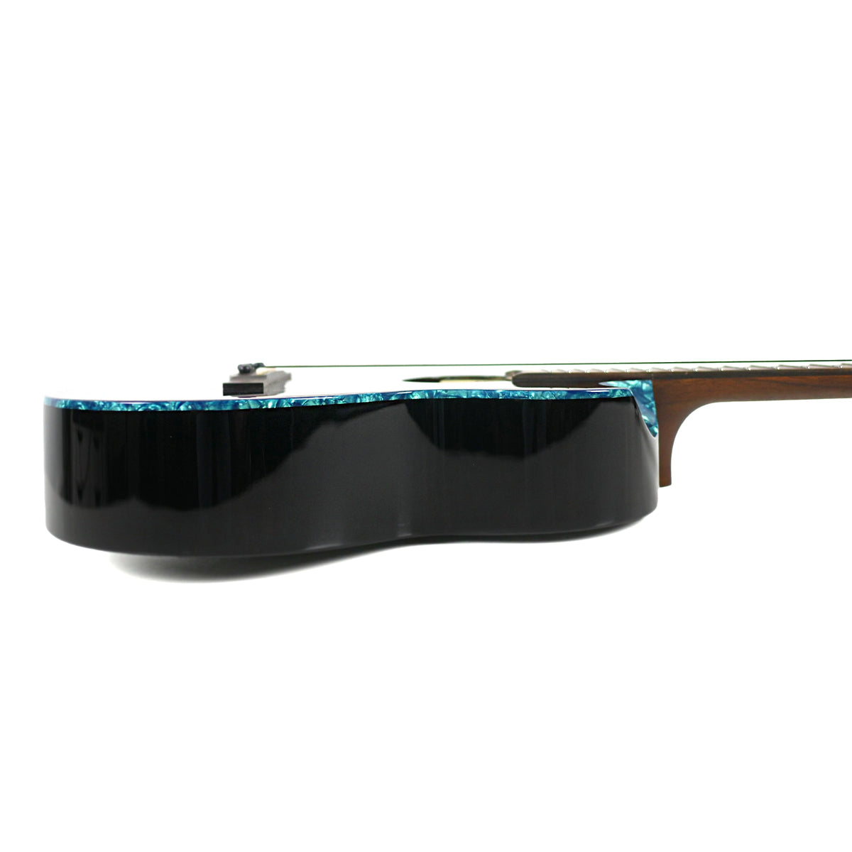 The side profile displays the black gloss finish and blue pearloid binding of the Flight Nighthawk Baritone.