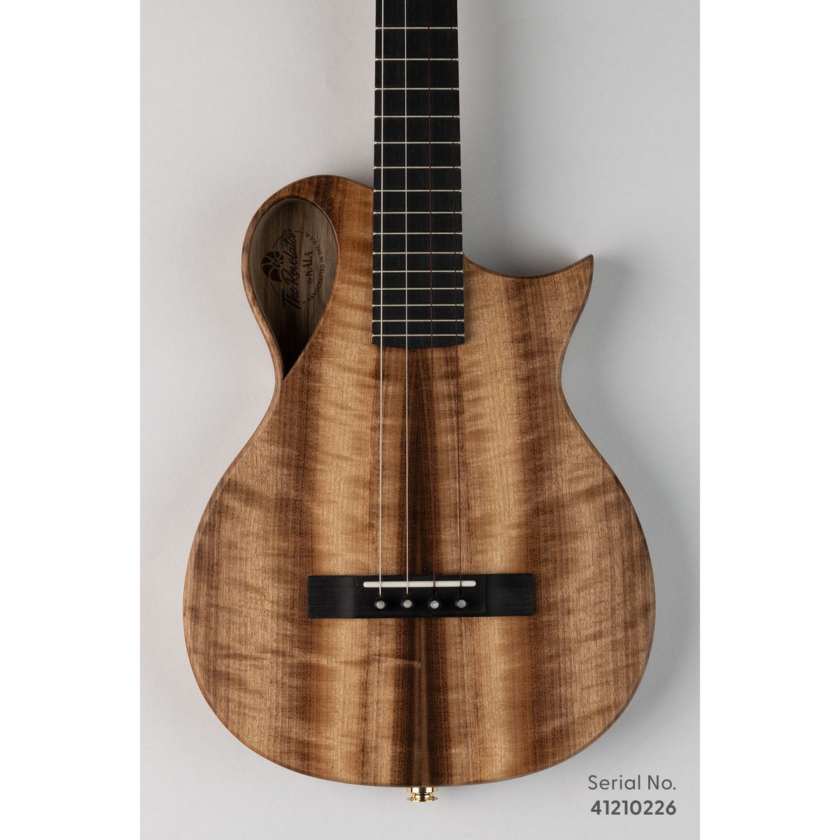 Kala NS-MYR-T Revelator Nautilus Myrtle tenor, serial 41210226, front view showing the figured myrtle top and cutaway
