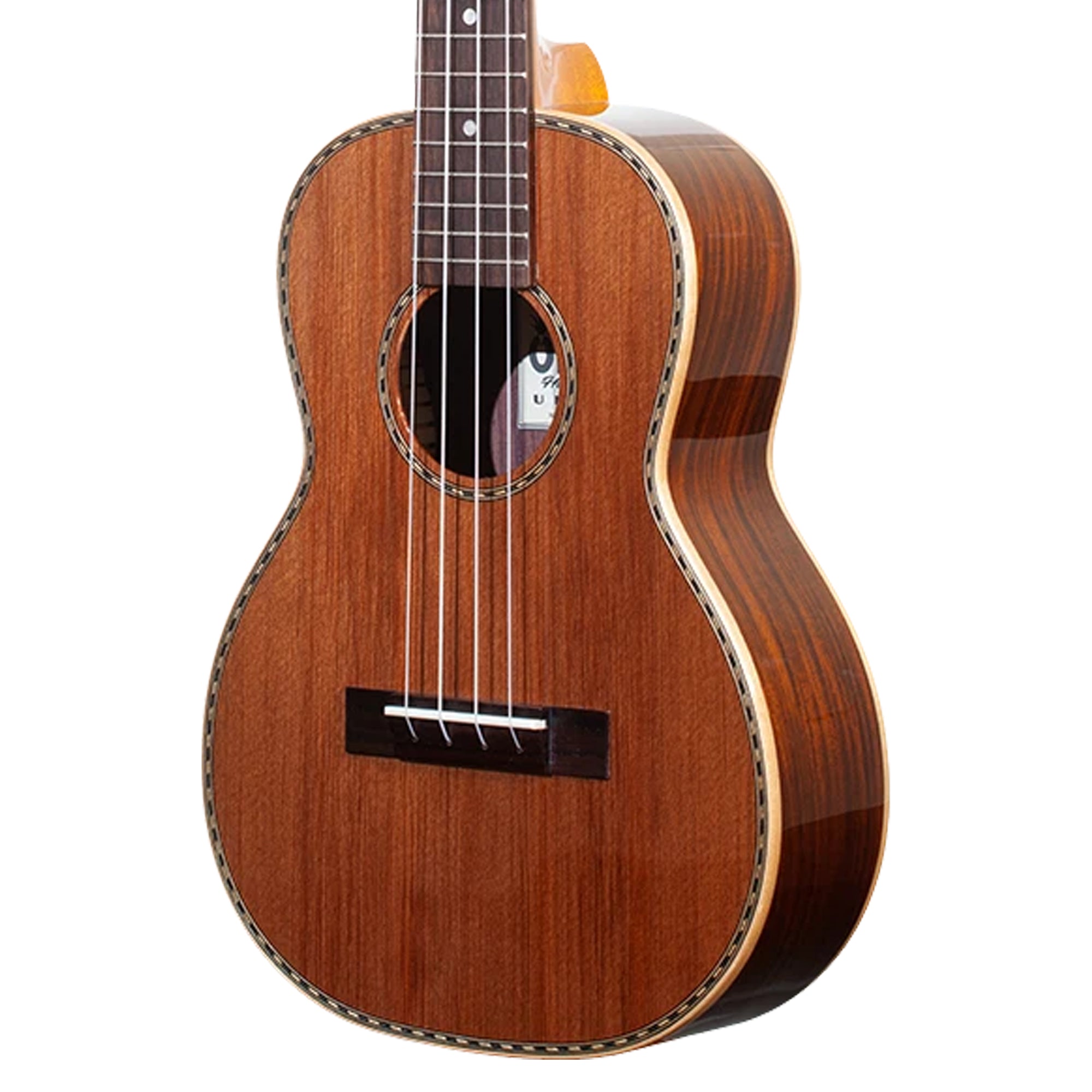 A close-up of a Ohana TK-42 body with a warm brown finish, decorative inlay around the sound hole and edges, six strings, and part of the dark fretboard visible against a white background.