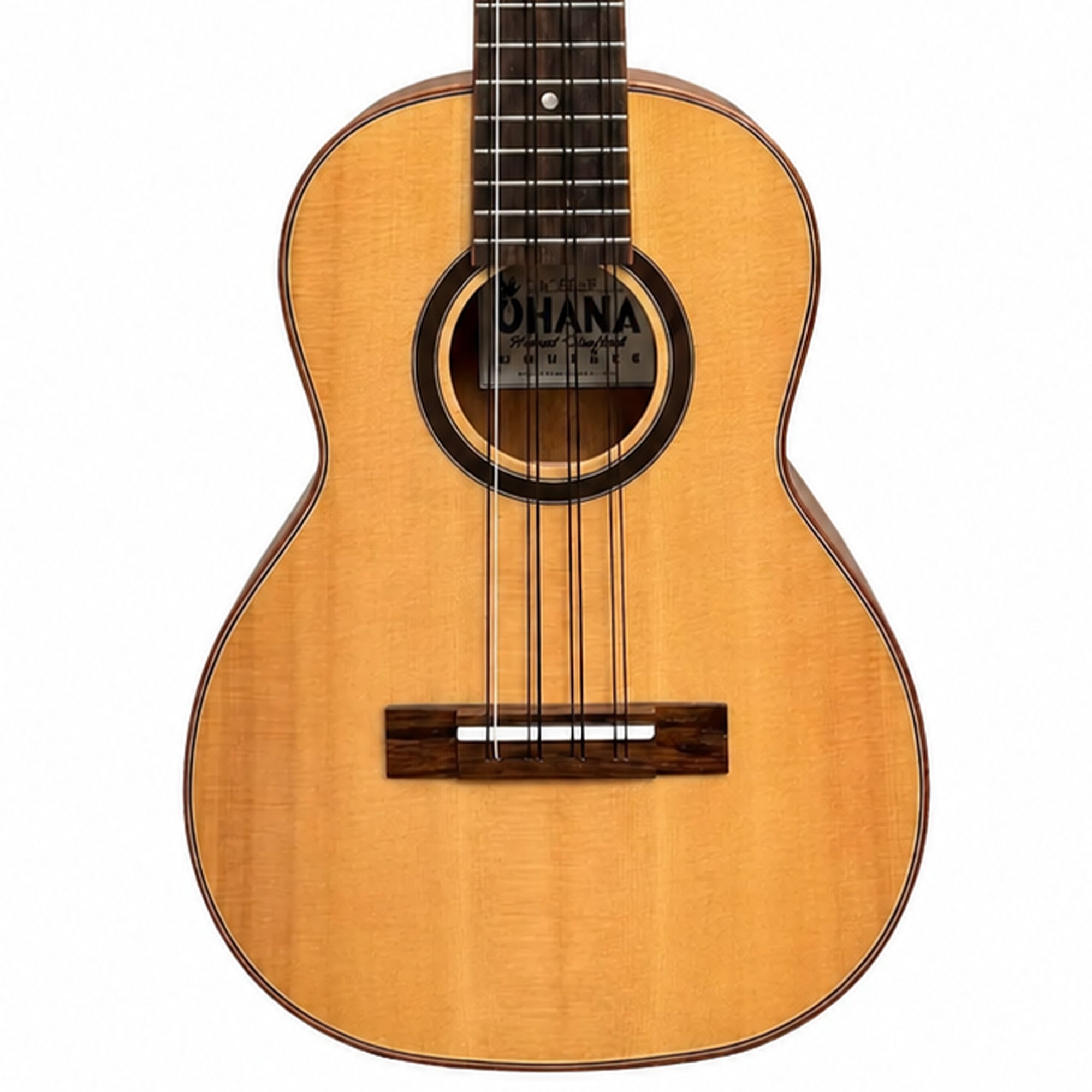 A close-up studio shot of a Ohana TK-70-8 body, showing the natural wood grain, soundhole, bridge, and part of the dark fretboard against a white background.