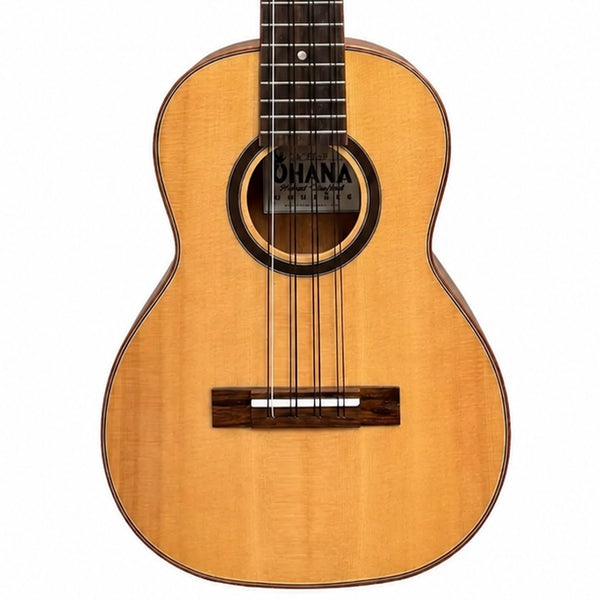 A close-up studio shot of a Ohana TK-70-8 body, showing the natural wood grain, soundhole, bridge, and part of the dark fretboard against a white background.