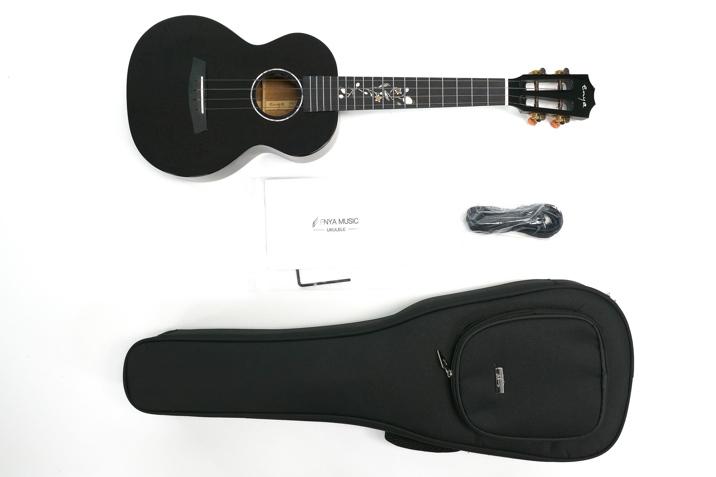 Package with Enya Tenor, allen wrench, booklet, strap and ukulele case