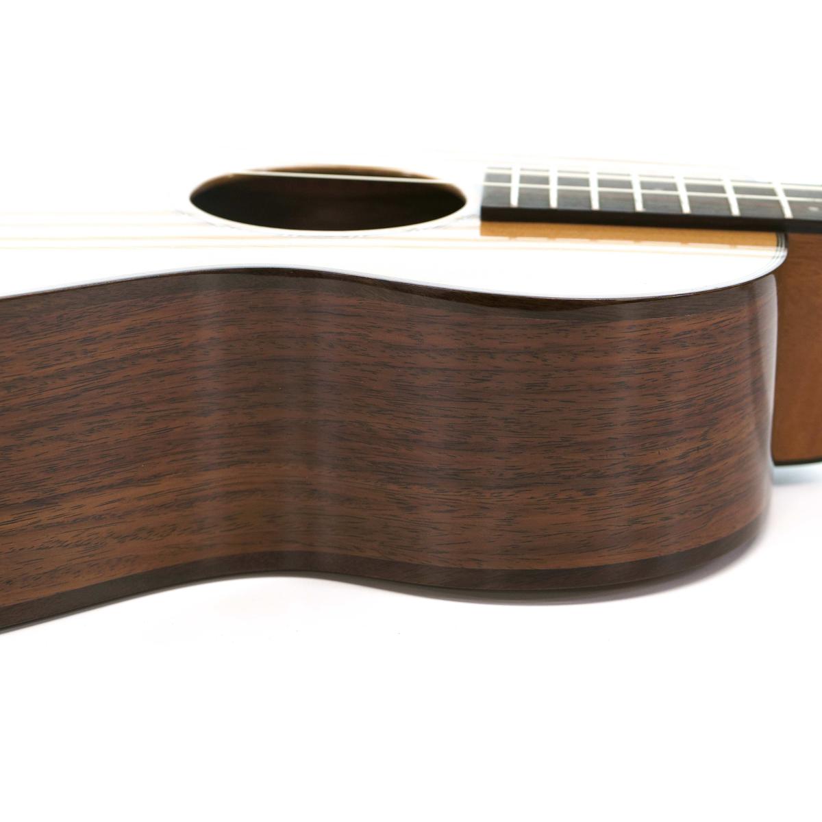 Close-up of the Pono ULN4-4 solid rosewood sides and maple binding