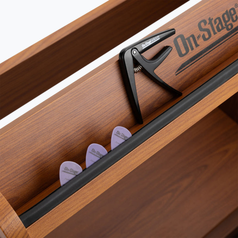 Accessory tray on top of the On-Stage GWS5000RB holding picks and a capo