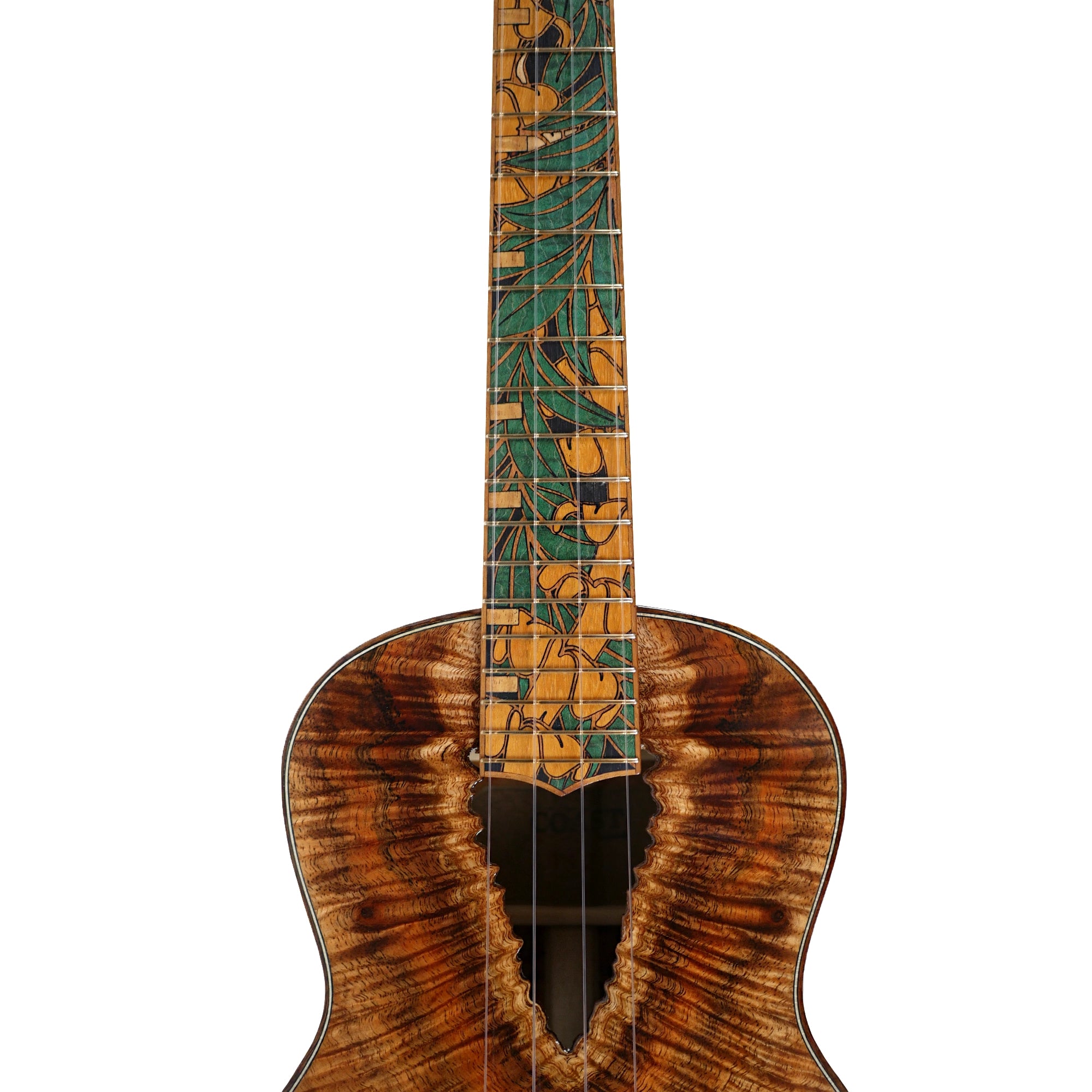 Coast #112 tenor ukulele with live edge curly Hawaiian koa body and intricate green leaf fretboard inlay.