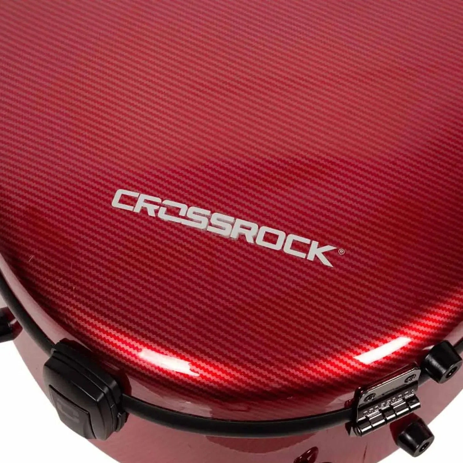 Close-up of a red Crossrock ultra-light fiberglass classical guitar case with carbon fiber texture.