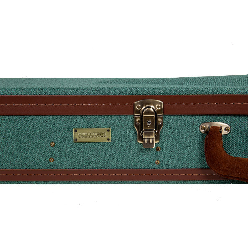 Crossrock CRW720BJMB malachite blue Master Series wood resonator banjo case close-up of the latch, nameplate, and handle on the malachite blue tweed exterior.