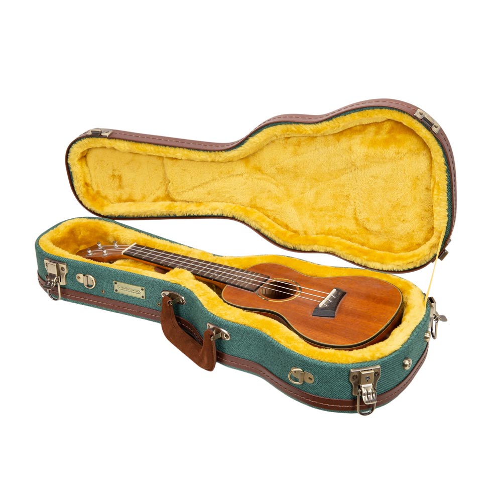 Crossrock CRW720CUMB malachite blue Master Series wood concert ukulele case open with a concert ukulele resting in the gold plush lining.