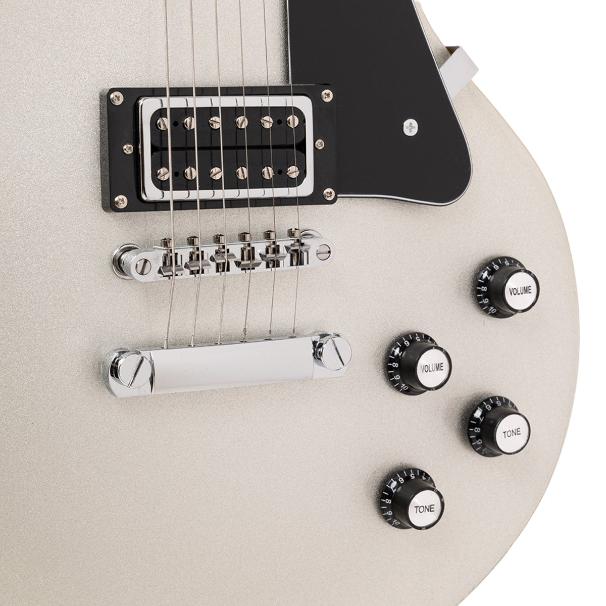 Close-up of the humbucker, tune-o-matic bridge, stop tailpiece and control knobs on the silver top Stagg SEL-STD