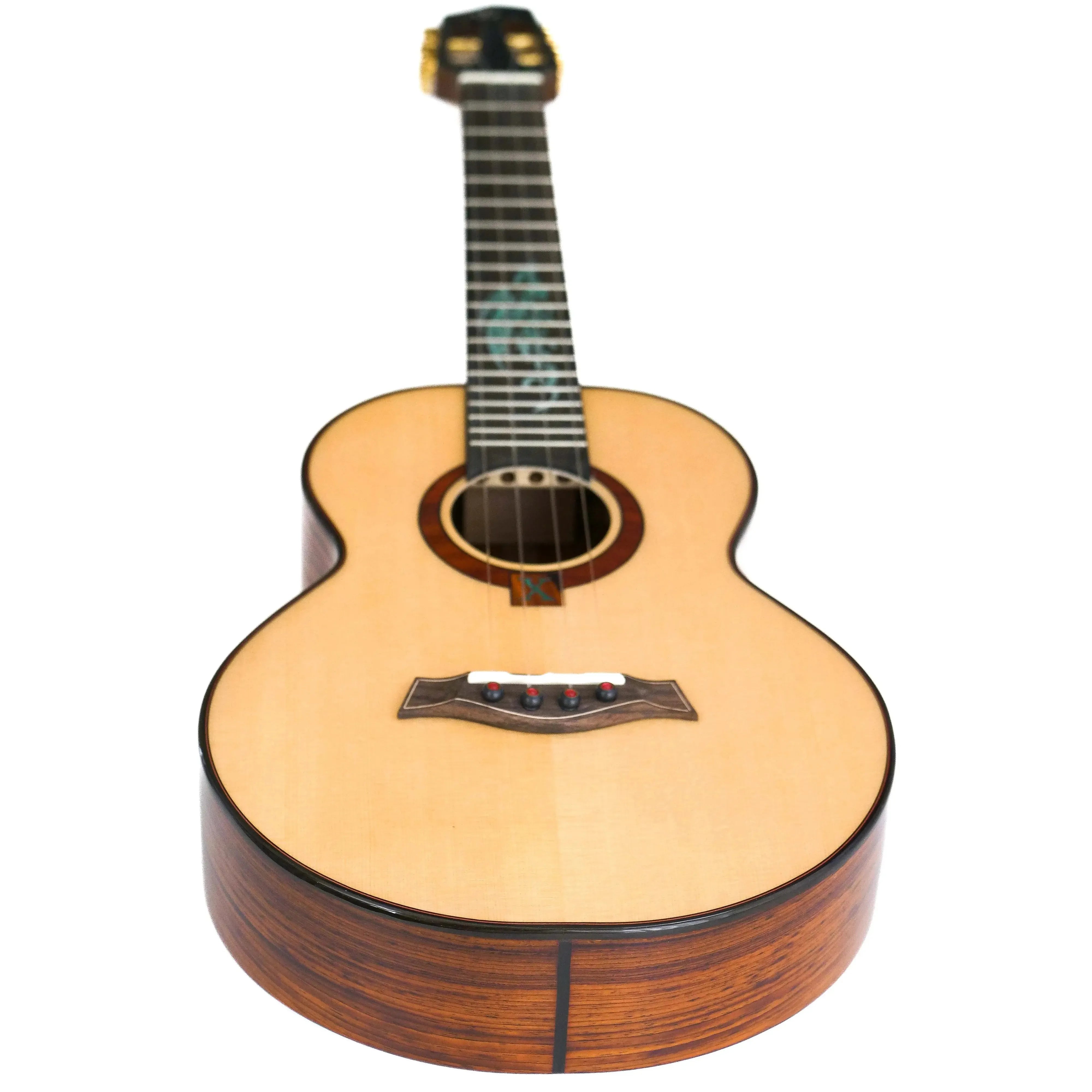 Flight A10 SC Cocobolo Dragon 10th Anniversary Tenor Ukulele with light spruce top and dark cocobolo sides.
