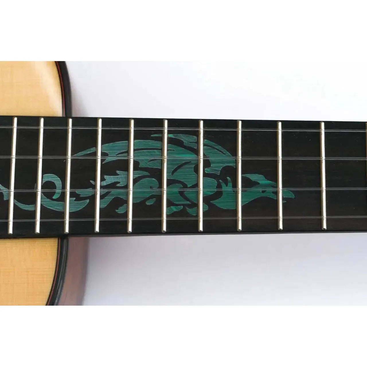 Flight A10 SC Tenor Ukulele ebony fretboard with turquoise dragon inlay.
