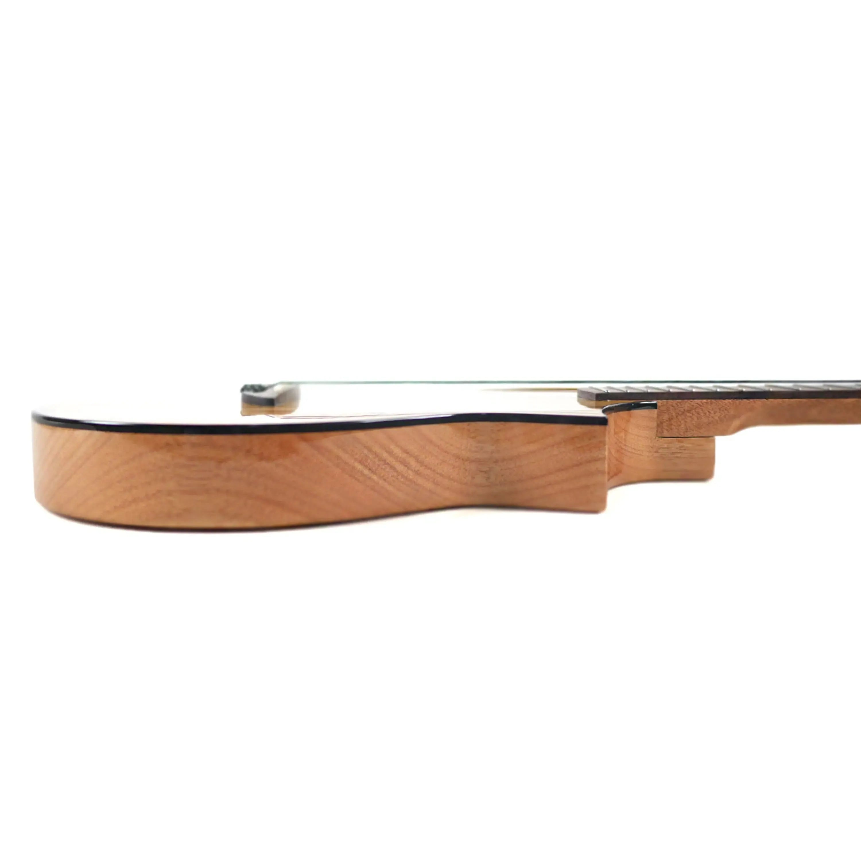 Side view of a Flight AVIATOR-CE Tenor Ukulele, showing its light brown solid mango body and dark fretboard.