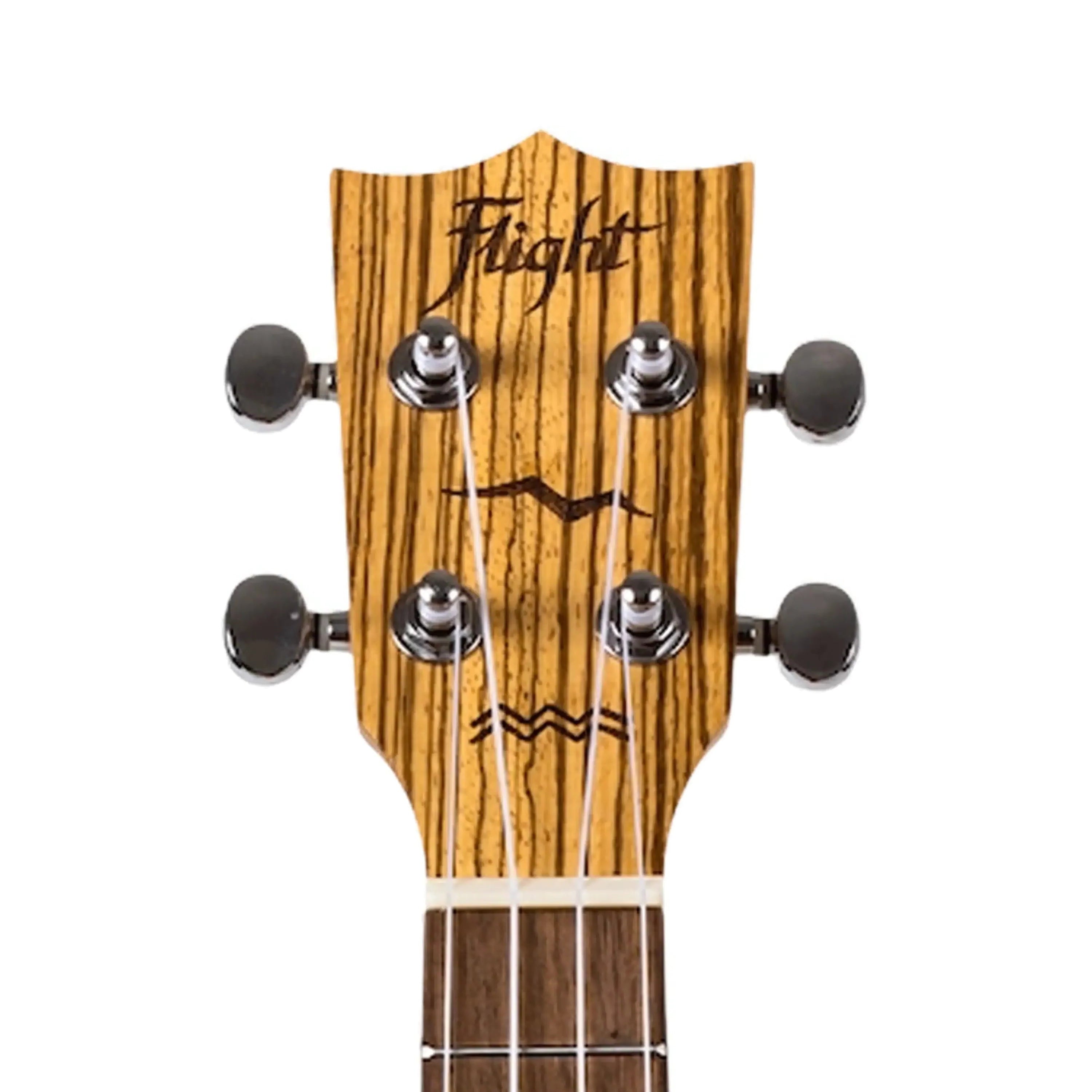 Flight DUC328 CEQ SP/ZEB Concert Ukulele headstock with zebrawood grain and black tuning pegs.
