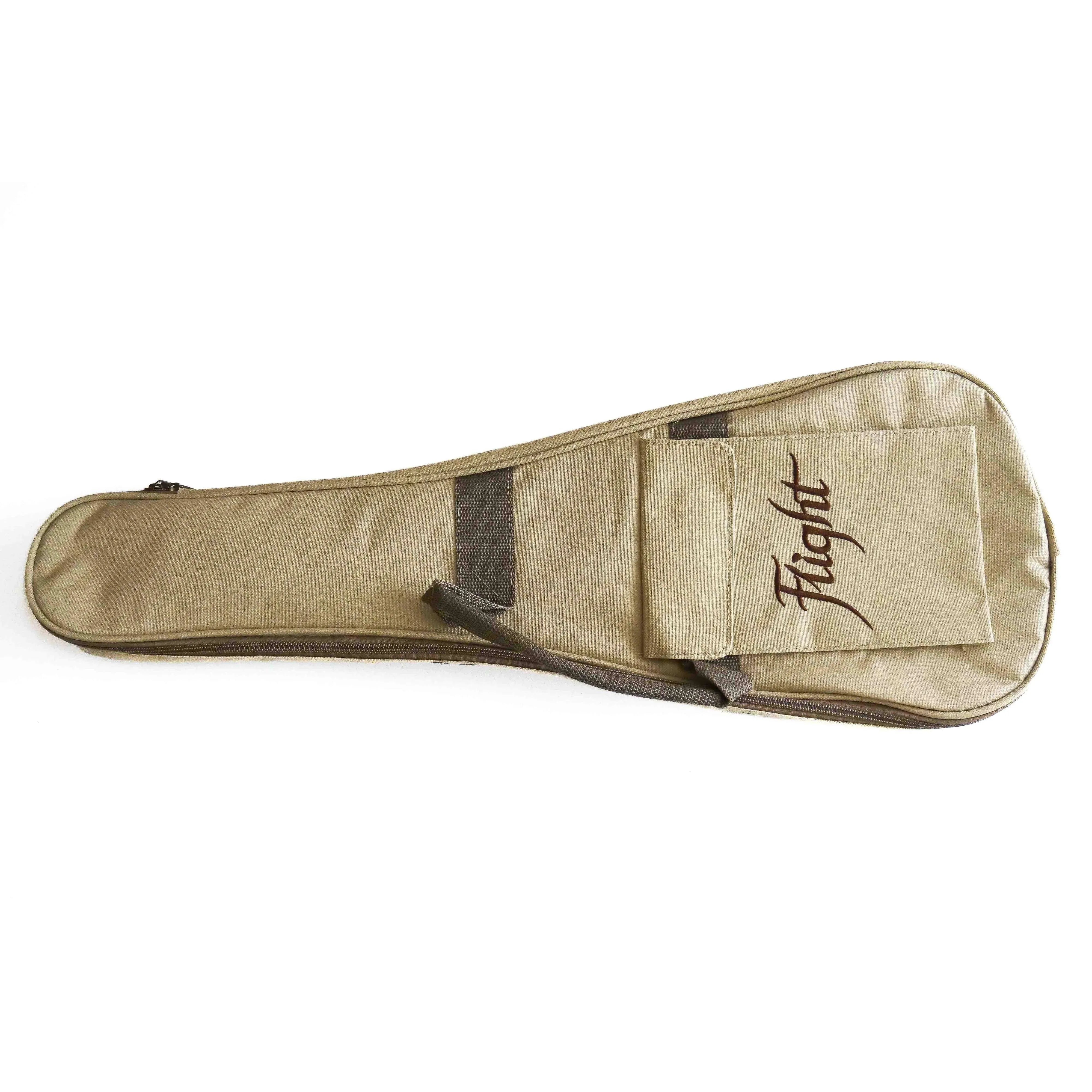 Flight ukulele gig bag in tan, featuring a zippered pocket and "Flight" logo.