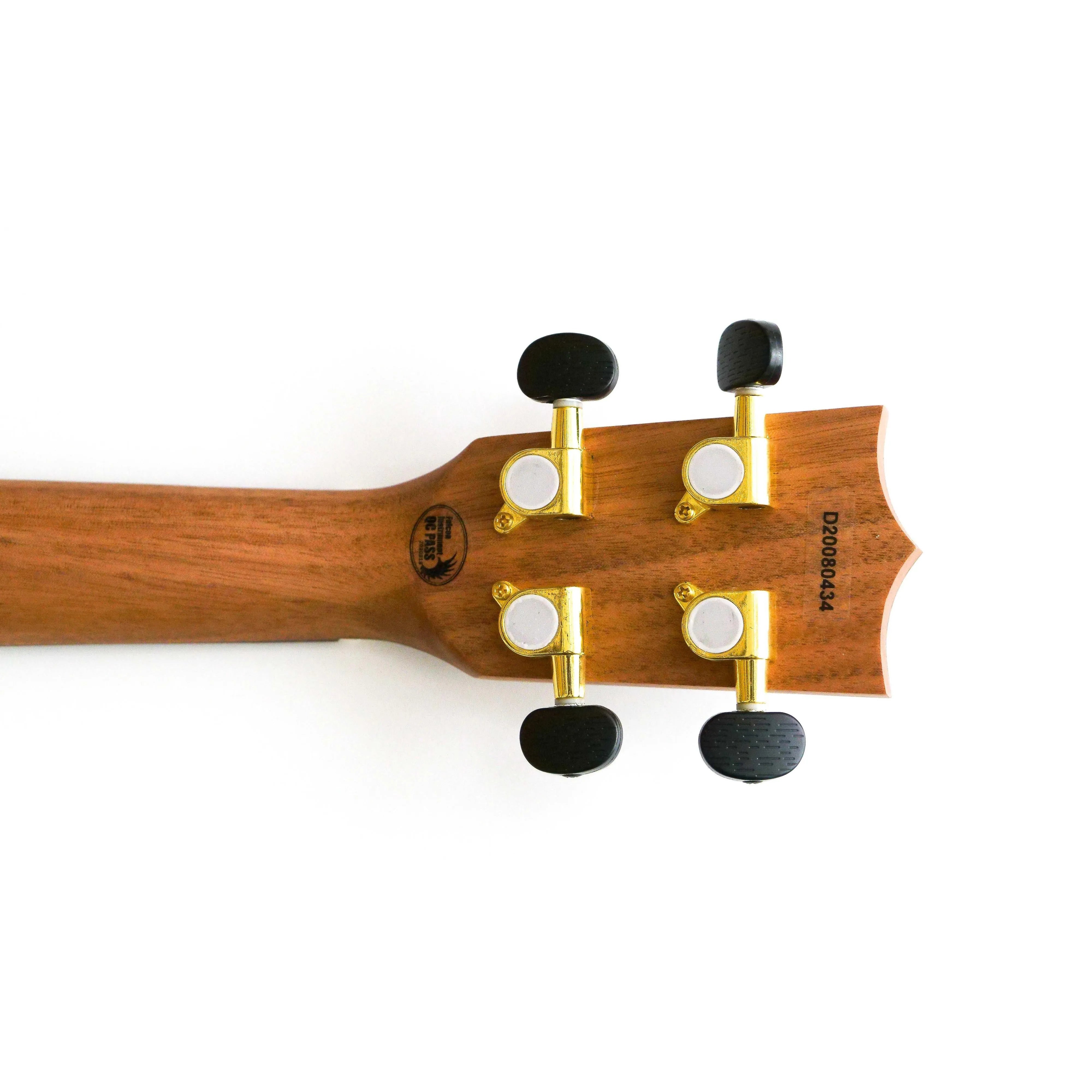 Back of Flight DUC430 Dao Concert Ukulele headstock with gold tuners and black buttons.