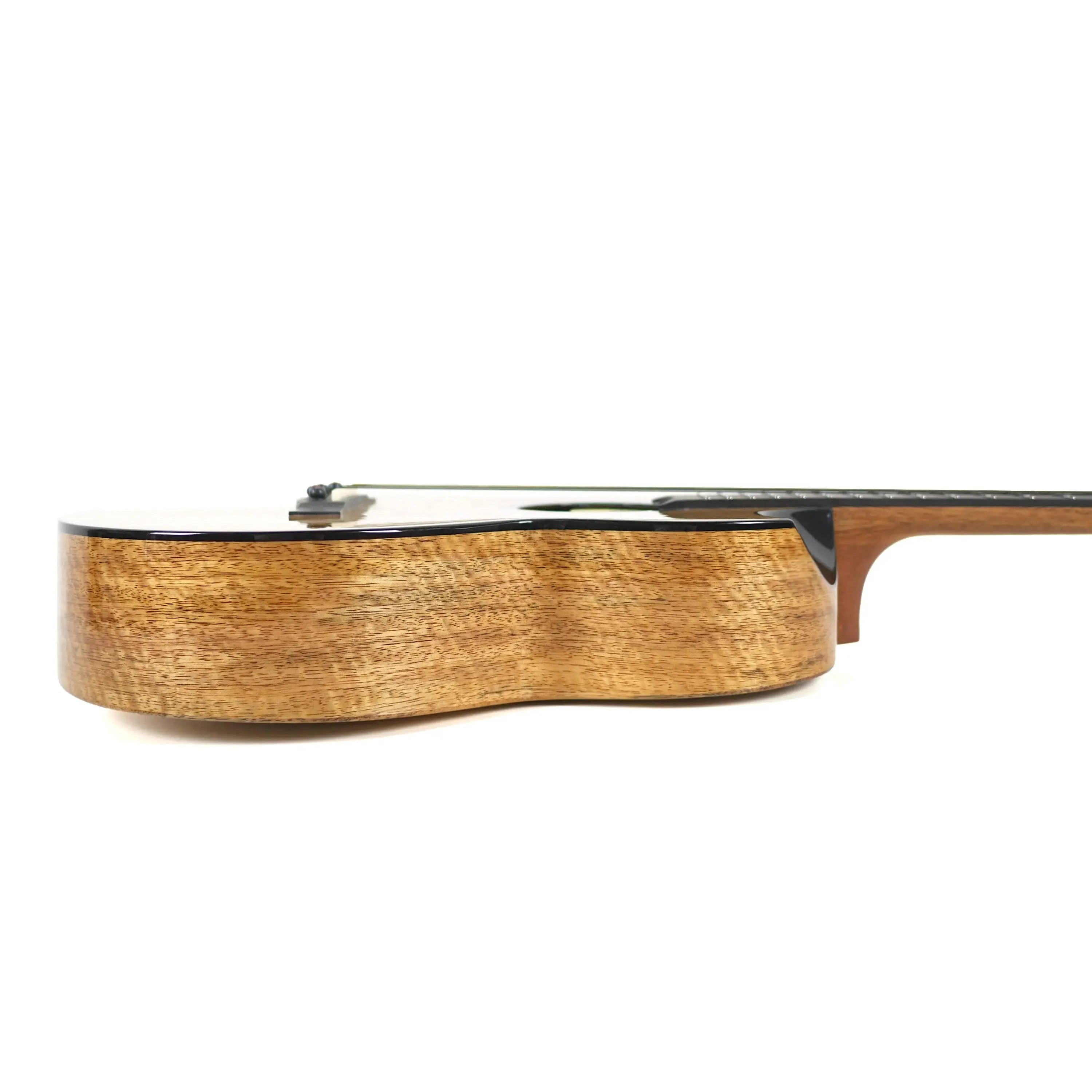 Flight Fireball solid mango baritone ukulele body with gloss finish and visible wood grain.