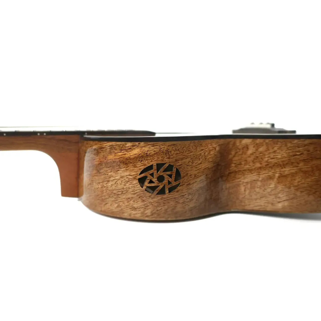 Flight Fireball EQ-A Solid Mango Baritone Ukulele side view, showing the natural wood grain and soundhole rosette.
