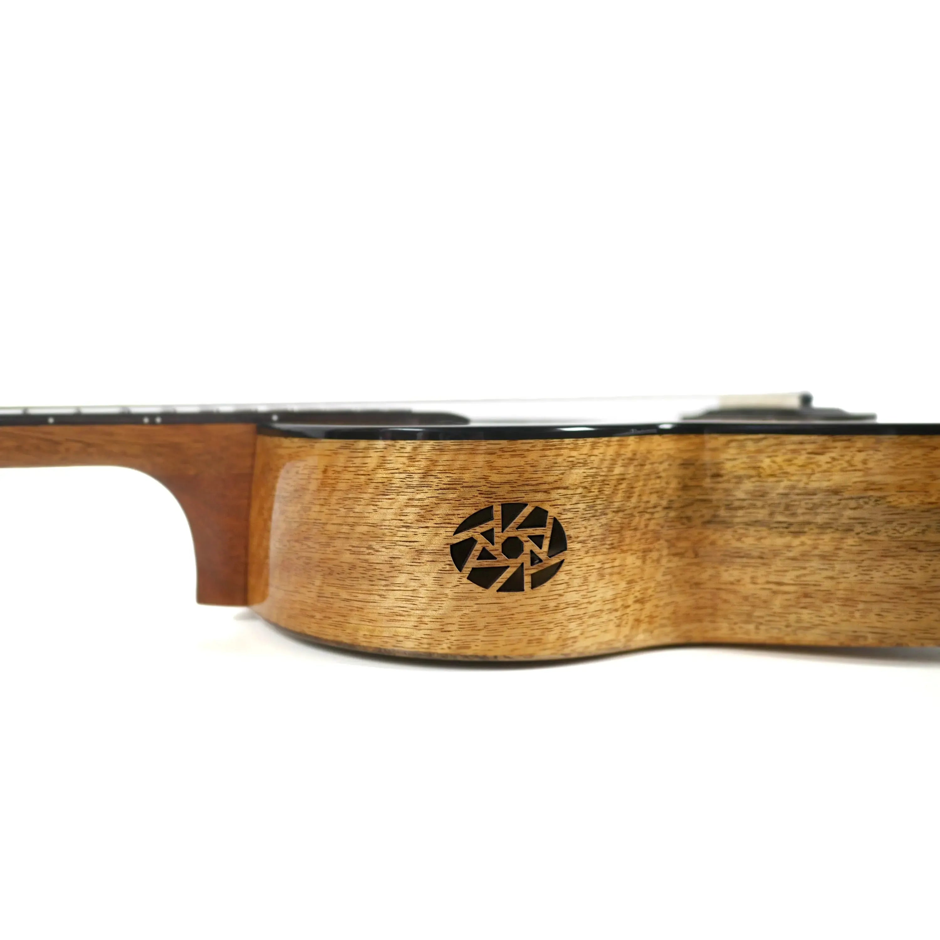 Flight Fireball solid mango baritone ukulele body with dyed maple rosette and binding.
