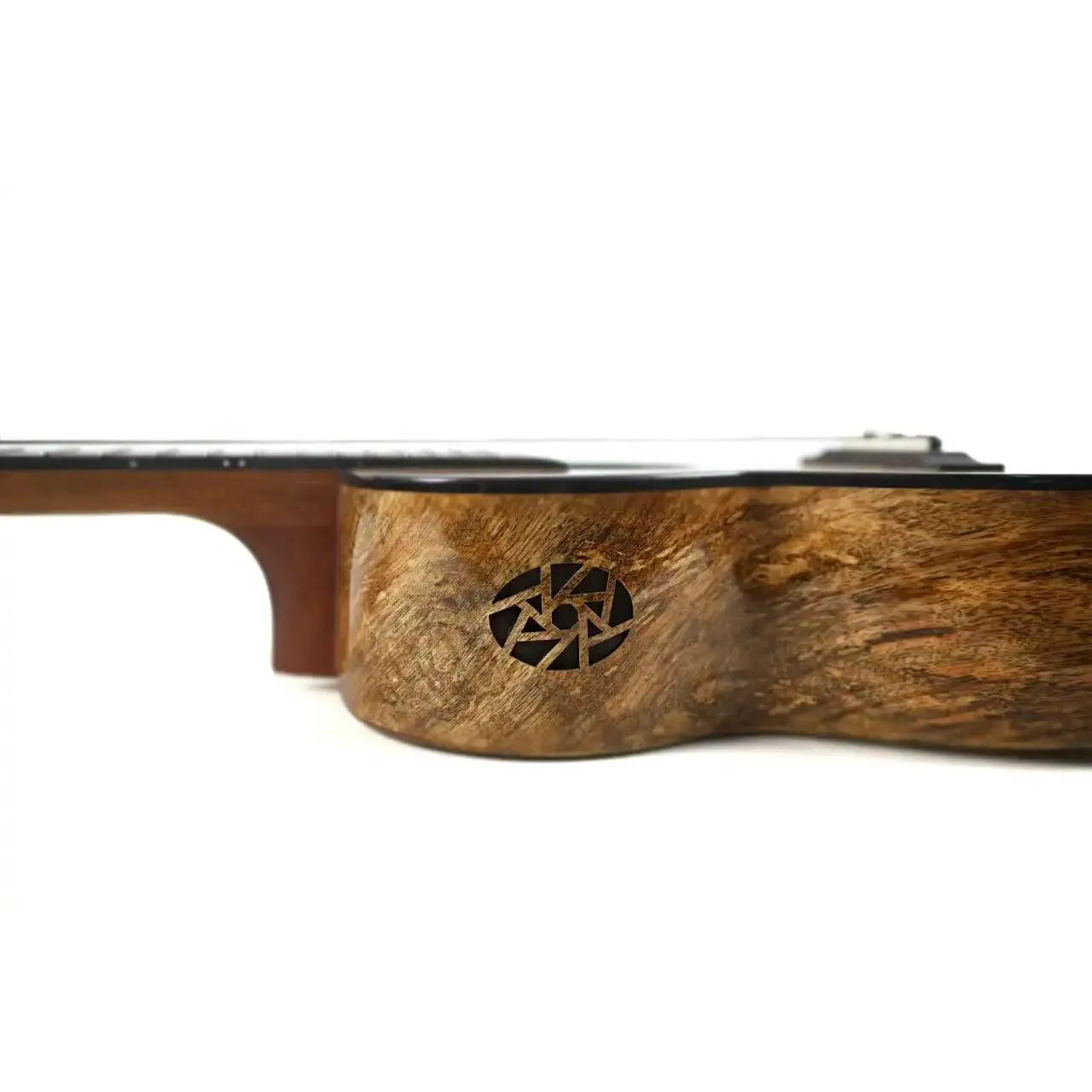 Flight Fireball EQ-A Tenor Ukulele side view, showing solid mango wood grain and soundhole.