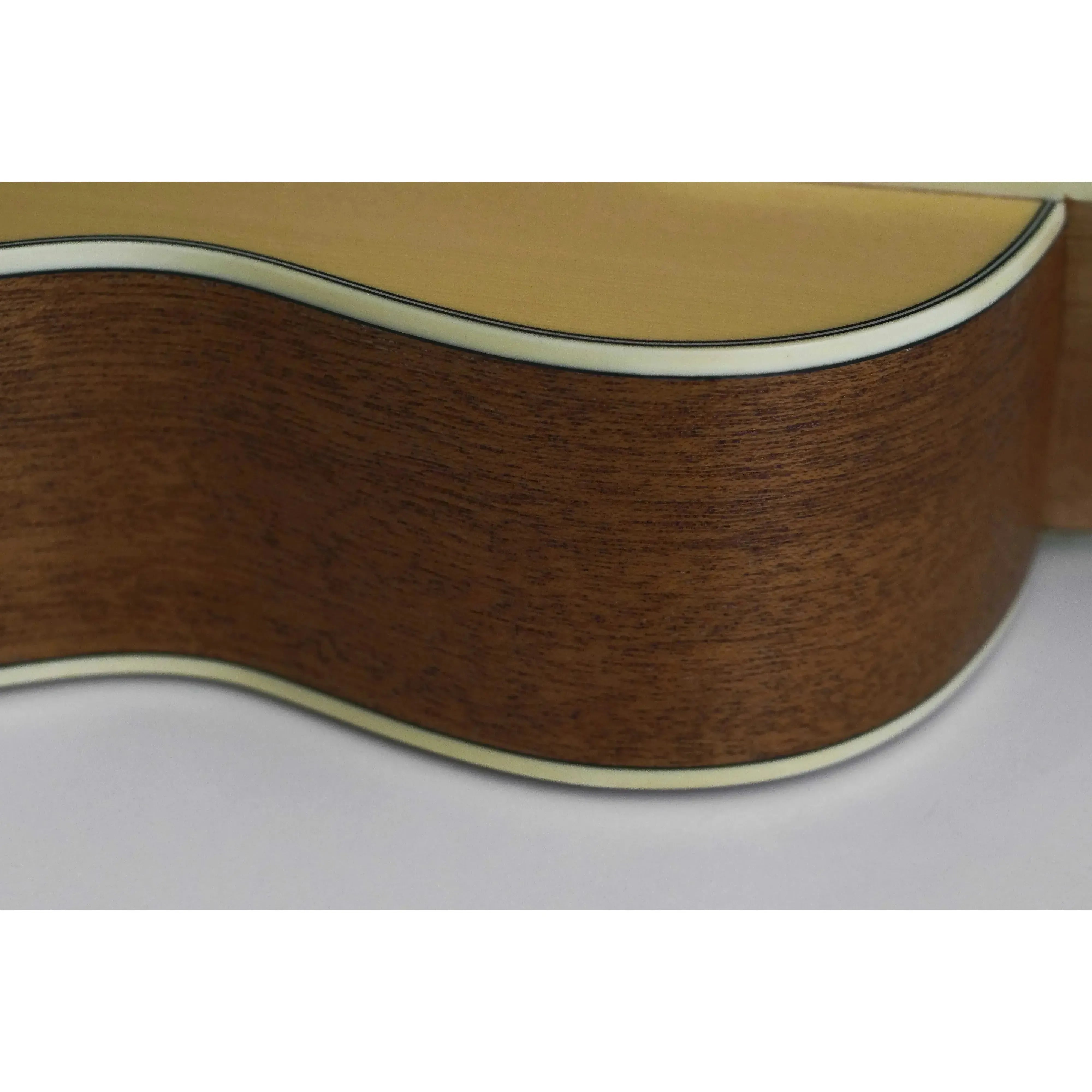 Close-up of the Flight GUT350 SP/SAP Guitarlele's spruce top and sapele back with white binding.