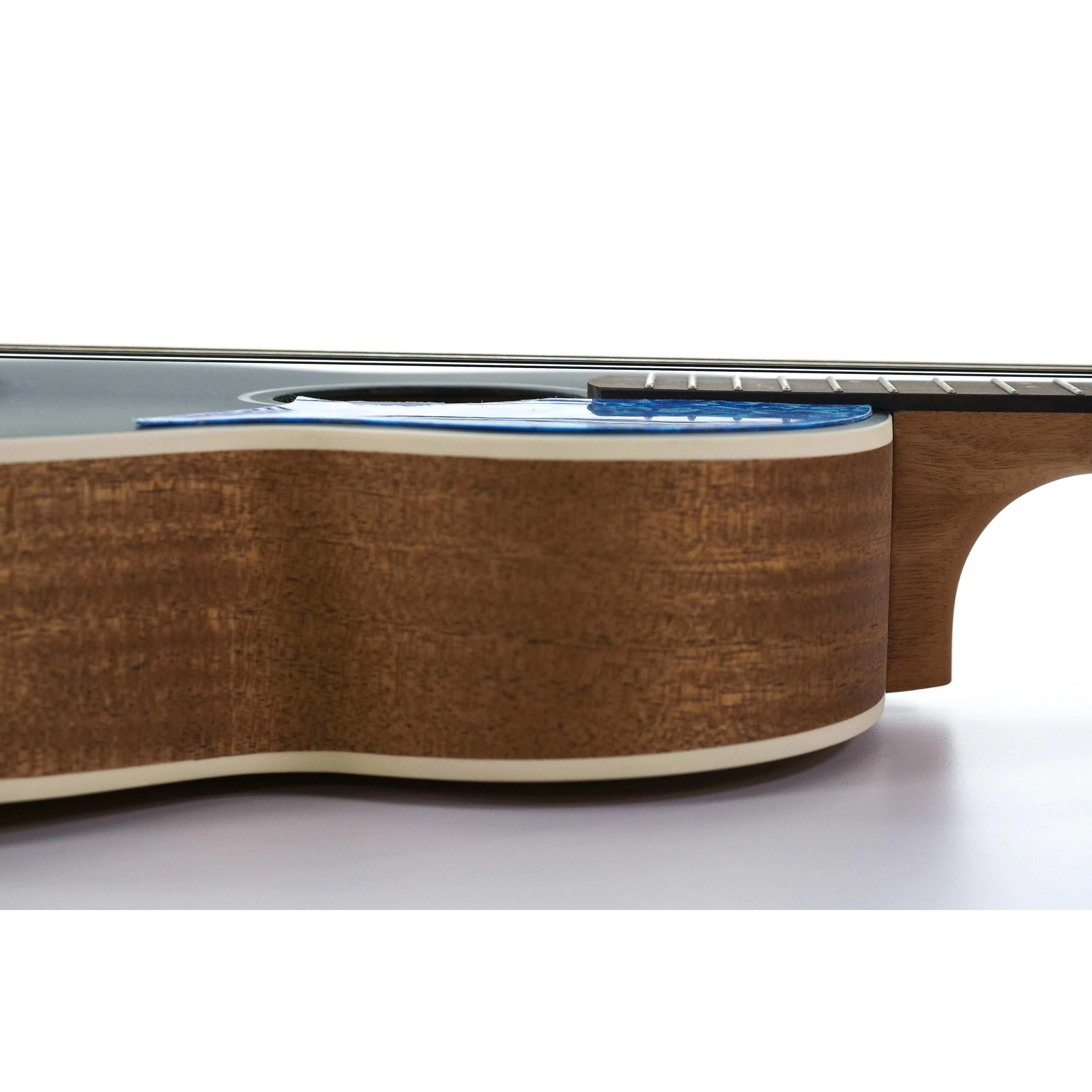 Flight IRIS BK Baritone Ukulele side view, showing dark spruce top, mahogany back, and blue pickguard.