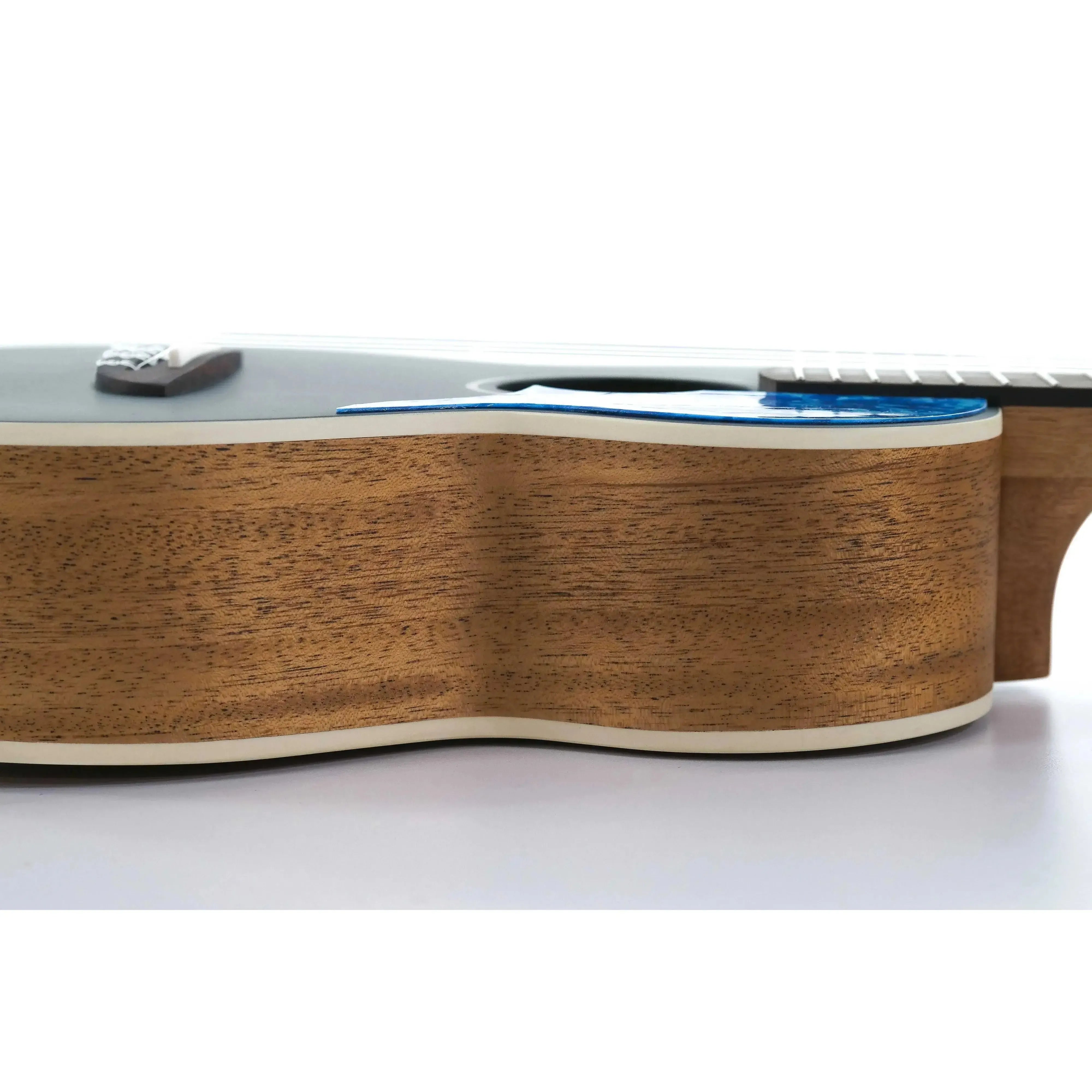 Flight IRIS Tenor Ukulele side view, showing mahogany back and sides with ivory binding.
