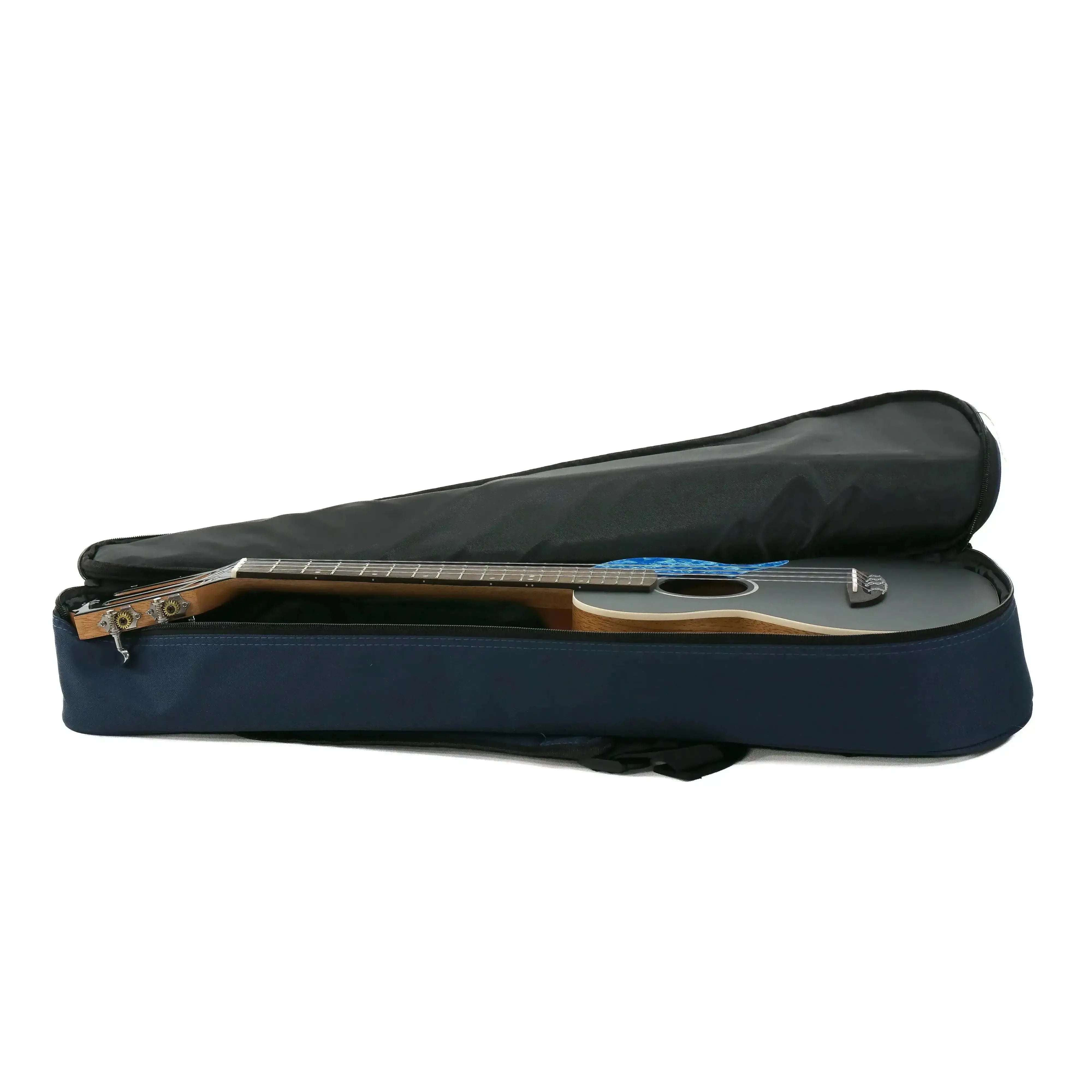 Flight IRIS tenor ukulele with spruce top and mahogany back, resting in a dark blue gig bag.
