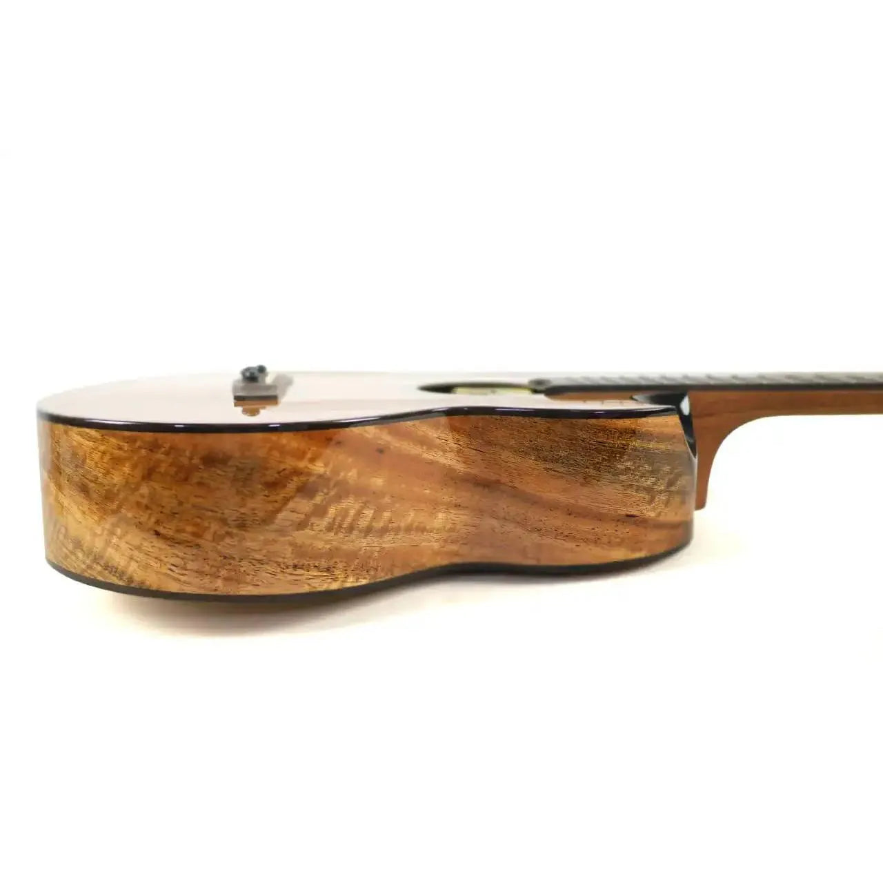 Flight Lily EQ-A Baritone Ukulele, side view showing mango laminate back and sides.