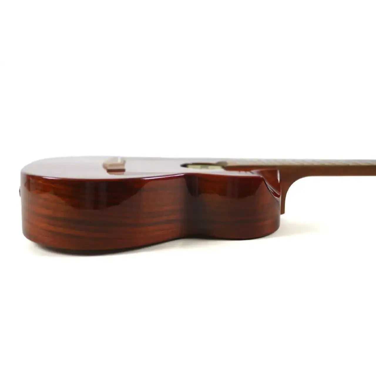 Flight Mustang EQ-A Tenor Ukulele, side view, showcasing its glossy solid acacia body and natural wood grain.